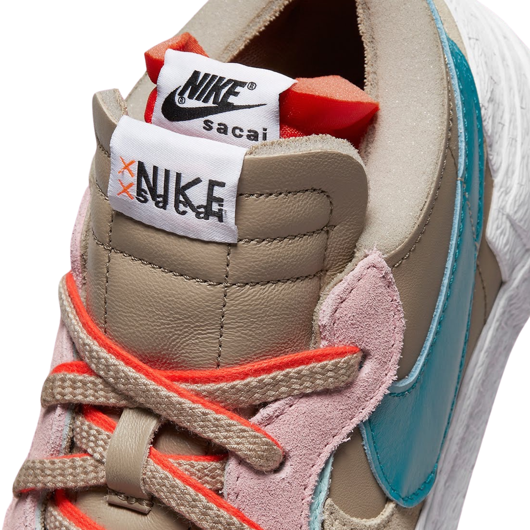 KAWS x Nike x Sacai Blazer Low Sneakers - Reed Bright Spruce White Colorway - Limited Edition Collab Shoes for Streetwear & Sneaker Collectors | Perfect for Casual Wear, Sneakerhead Collections & Urban Fashion
