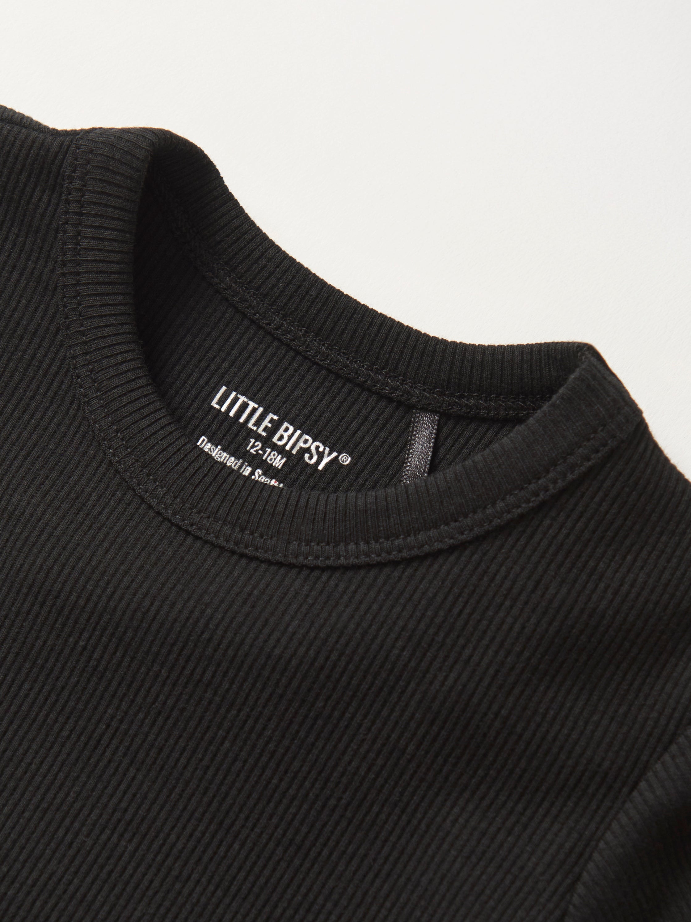 Stylish Ribbed Lettuce Trim Tee in Black - Perfect for Casual Outfits, Layering & Everyday Wear