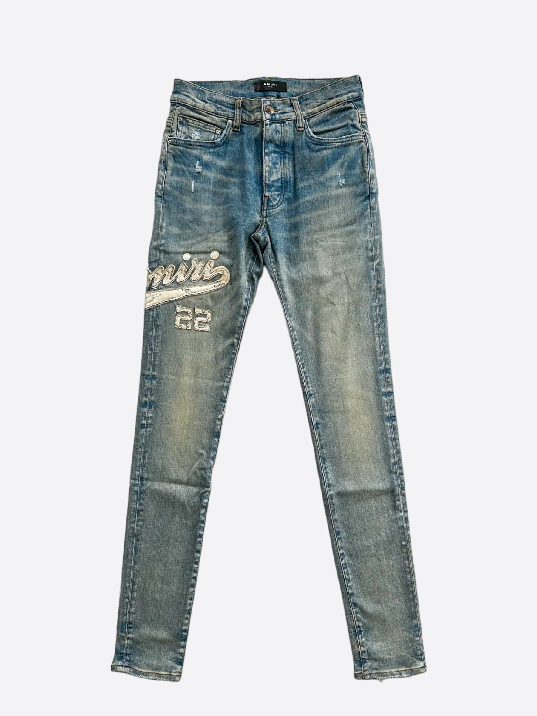 Amiri Clay Indigo Varsity Applique Logo Jeans for Men - Premium Distressed Denim Pants with Embroidered Patch | Streetwear Fashion & Casual Outfit