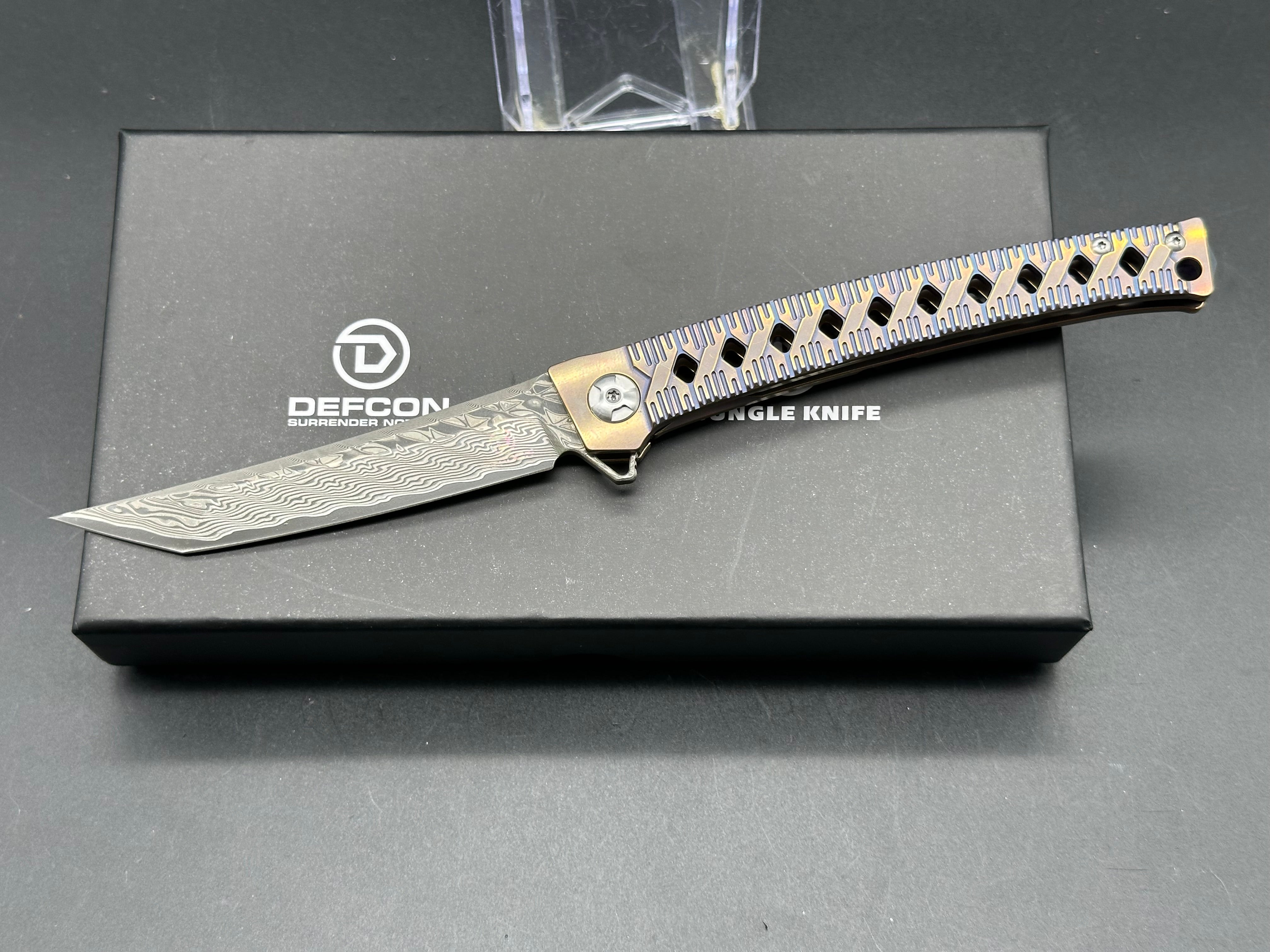 DEFCON JK Series Folding Knife - Damascus Steel Blade with Bronze Titanium Handle - EDC Pocket Knife for Camping, Hiking & Outdoor Survival