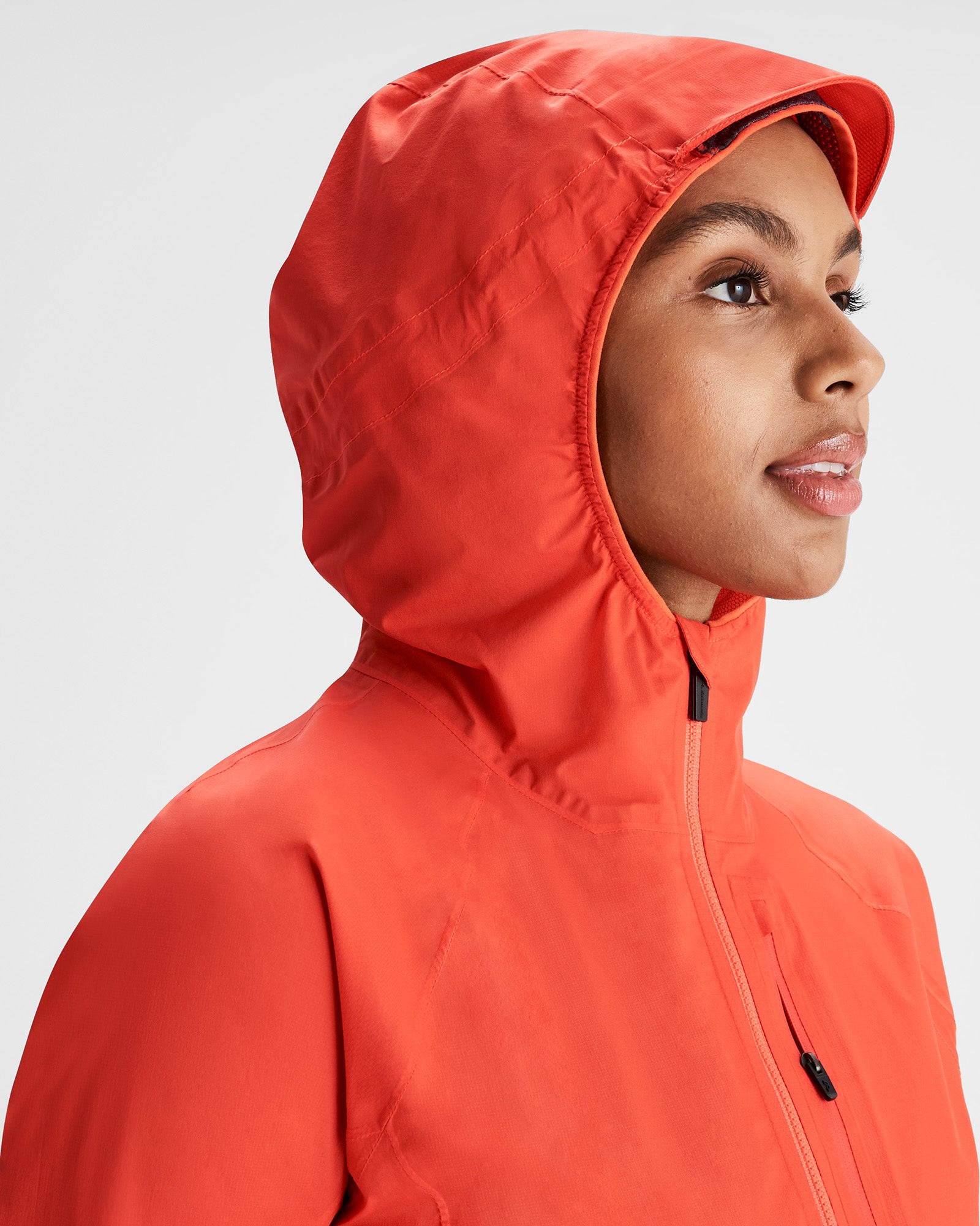Women's Seeker 2.5L Waterproof Rain Jacket - Hut Orange | Lightweight Windproof Outdoor Shell for Hiking, Camping & Travel