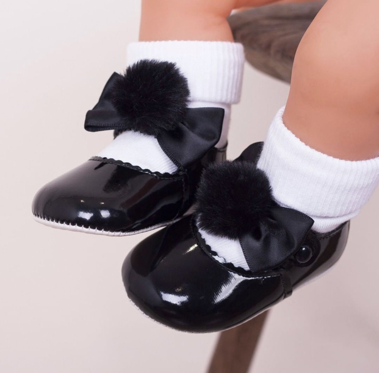 Black Pom Pom Soft Sole Baby Shoes for Newborns & Infants - Comfortable & Cute First Walkers for Indoor & Outdoor Use