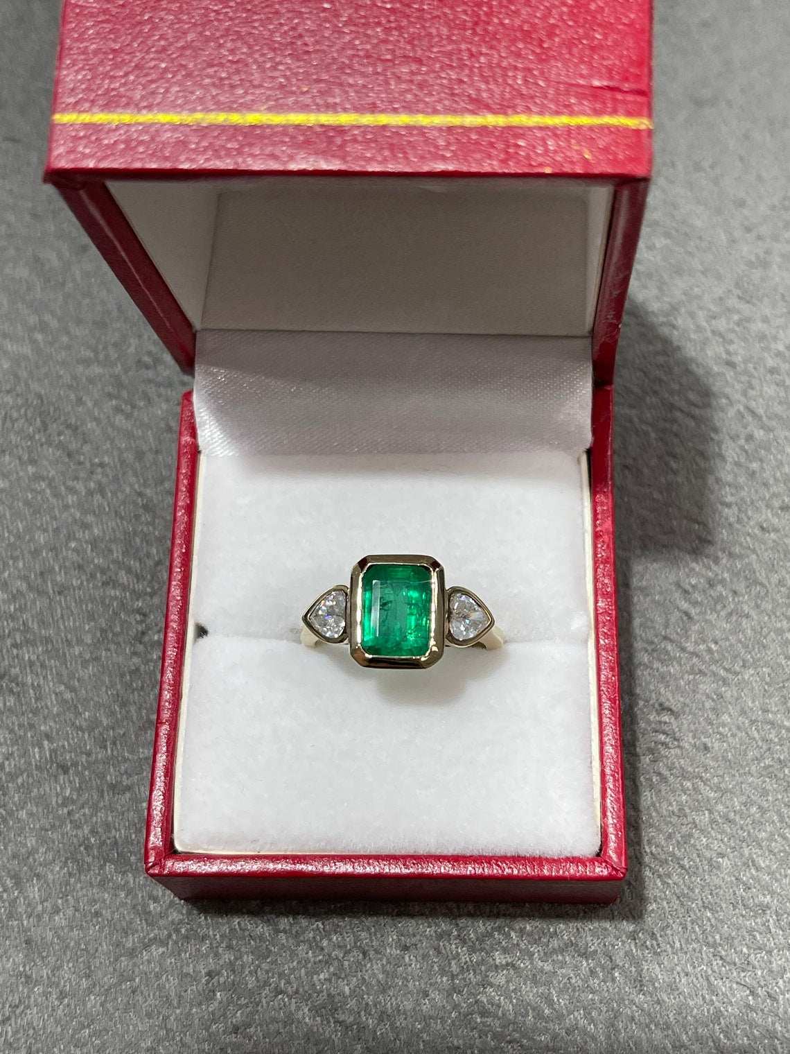 2.54tcw Natural Emerald & Heart Cut Diamond Three Stone Ring in 18K Gold - Elegant Bezel Setting for Engagement, Anniversary & Special Occasions
