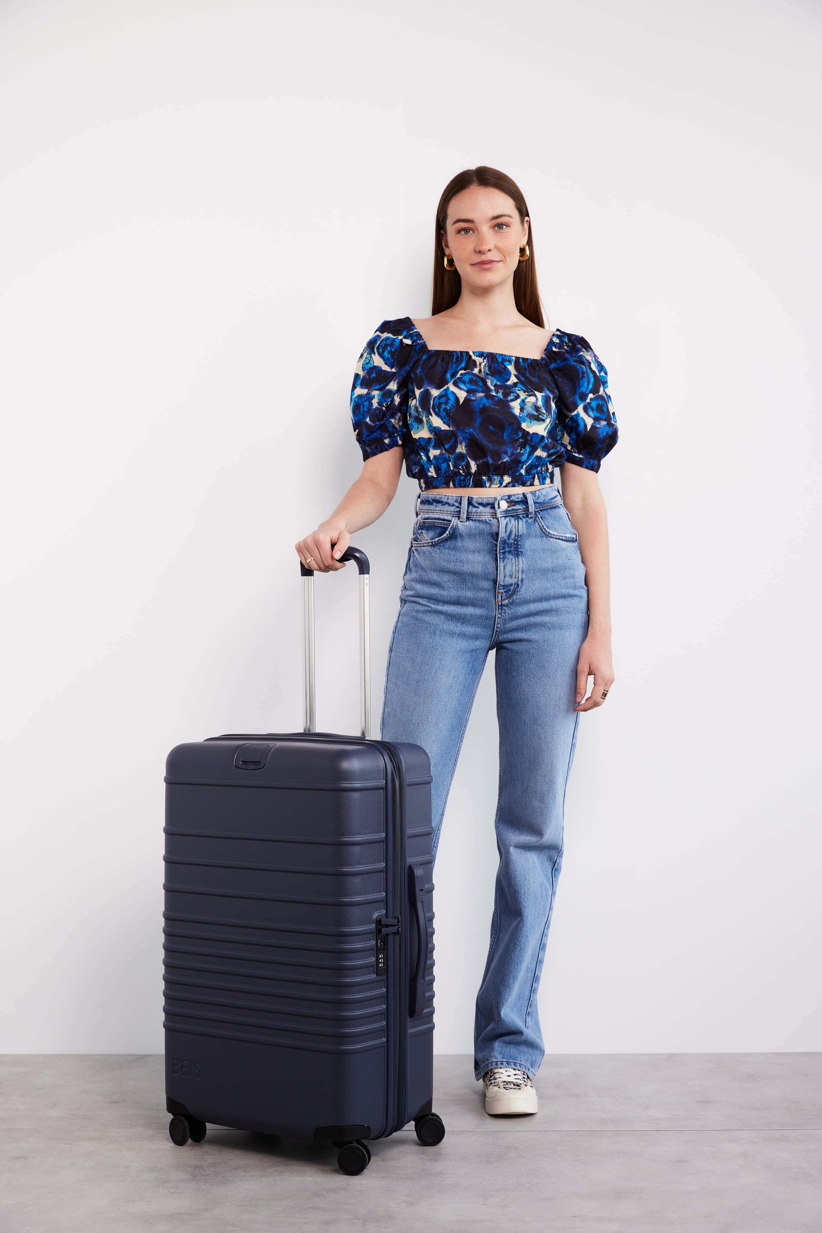 Navy Medium Check-In Rolling Luggage - Perfect for Air Travel & Business Trips