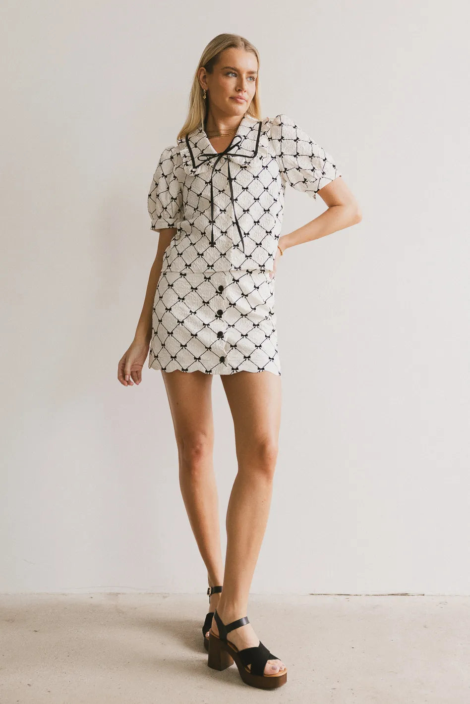 Maia Bow Mini Skirt - Women's Floral Print Pleated Skirt with Bow Detail | Perfect for Summer Outfits, Date Nights & Casual Wear
