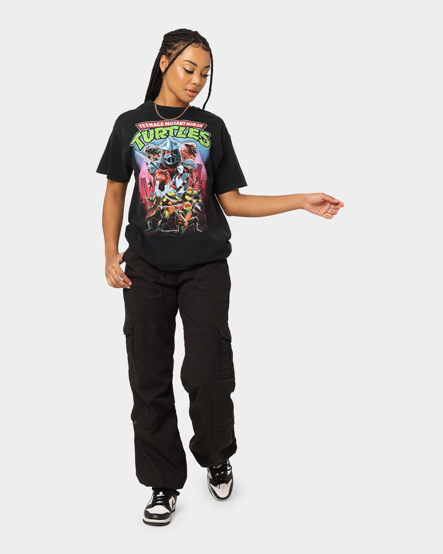 Vintage Black Teenage Mutant Ninja Turtles Graphic T-Shirt | Retro TMNT Merchandise | Perfect for Cosplay, Comic Con & 90s Nostalgia Fans