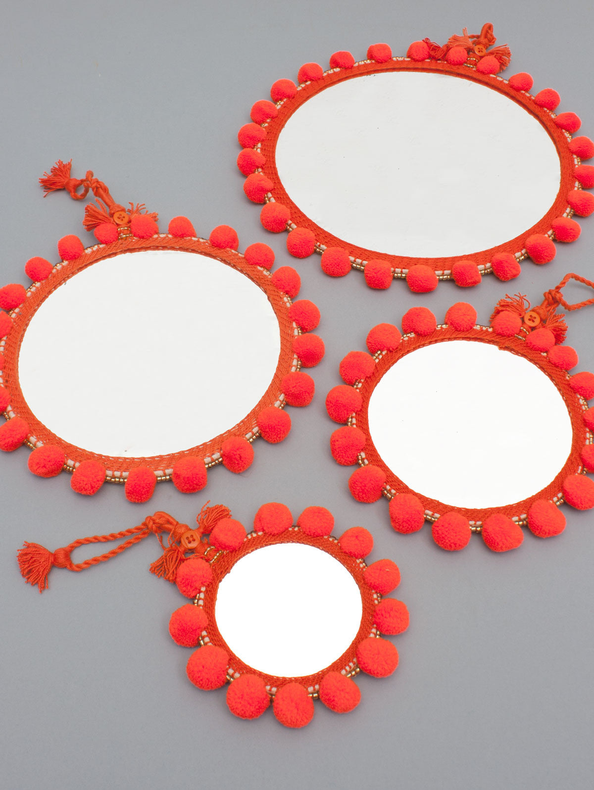 Orange Pom Pom Wall Mirror - Boho Home Decor for Bedroom, Living Room & Nursery - Handmade Decorative Mirror with Tassels