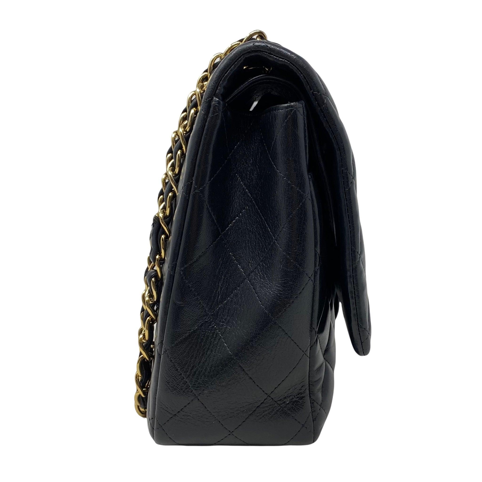 Chanel Black Lambskin Maxi Classic Flap Bag - Luxury Designer Handbag for Women | Perfect for Evening Events, Parties & Special Occasions