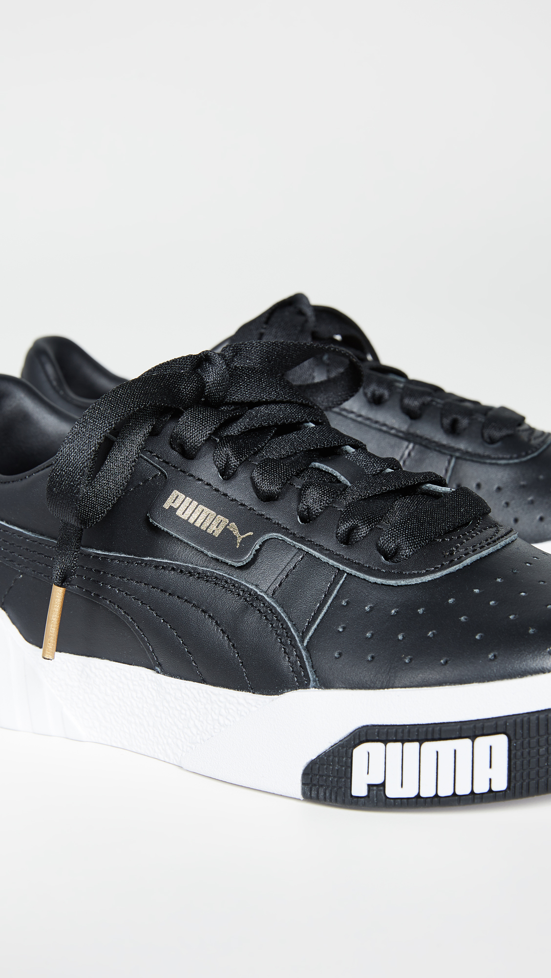 PUMA Women's Cali Bold Sneakers - Black & Metallic Gold - Size 6.5 US - Comfortable Athletic Shoes for Running, Gym & Casual Wear