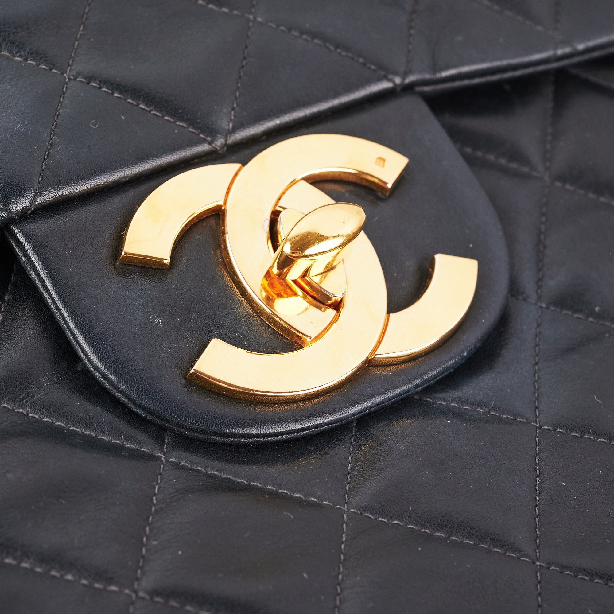Vintage Chanel Maxi Flap Bag in Black with 24K Gold Hardware - Perfect for Luxury Fashion & Special Occasions