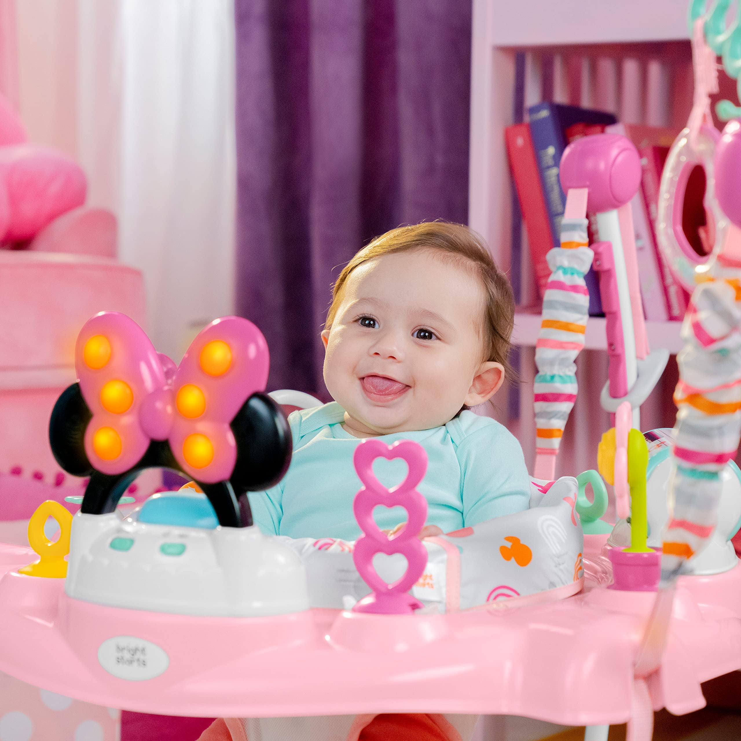Bright Starts Disney Baby Minnie Mouse Forever Besties Baby Activity Jumper with 10 Interactive Toys, Lights & Sounds, 360-Degree Rotating Seat for Infants 6-12 Months (Pink) - Perfect for Playtime, Learning & Motor Skill Development