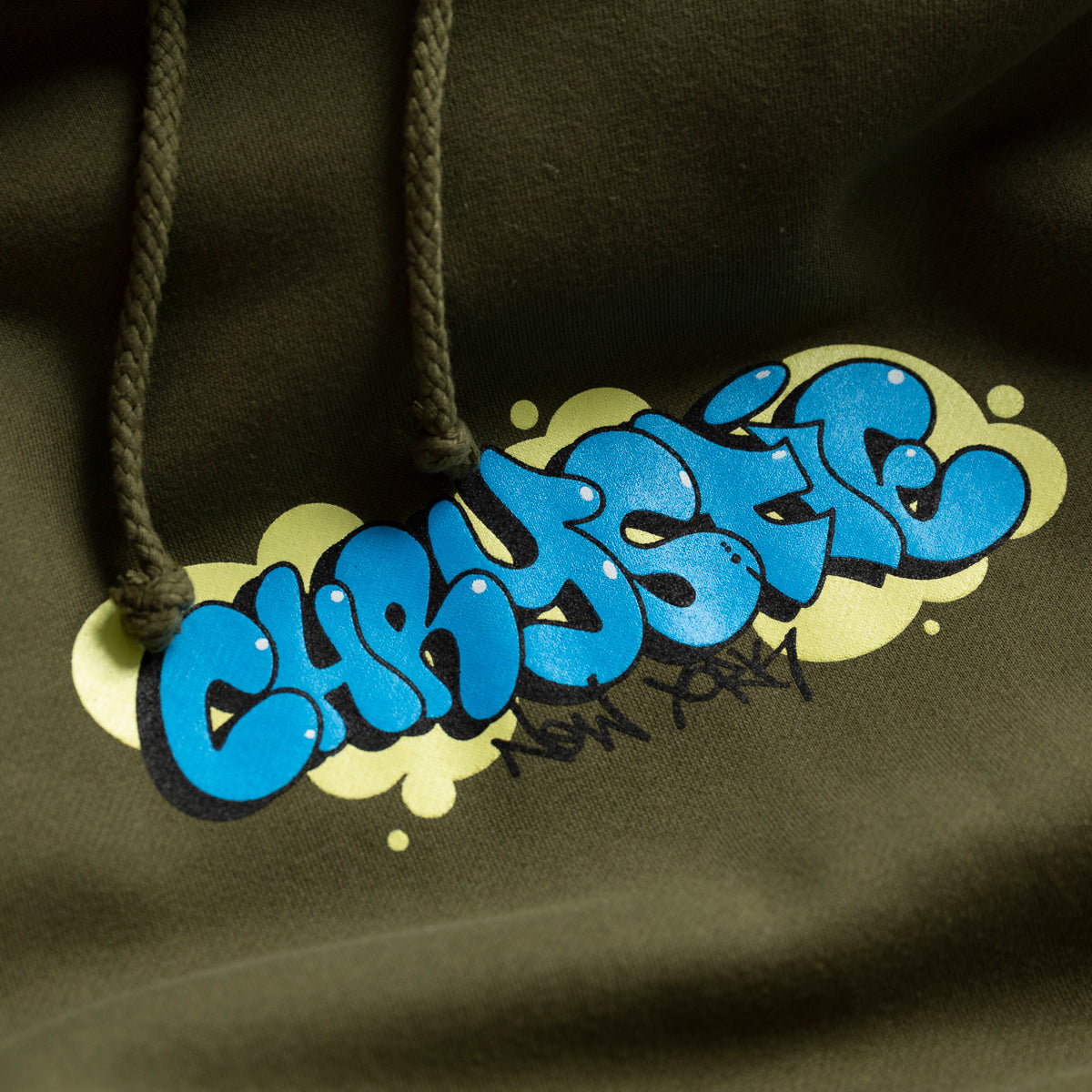Chrystie NYC Bubble Graffiti Logo Hoodie - Army Green | Trendy Streetwear for Urban Fashion & Casual Outfits