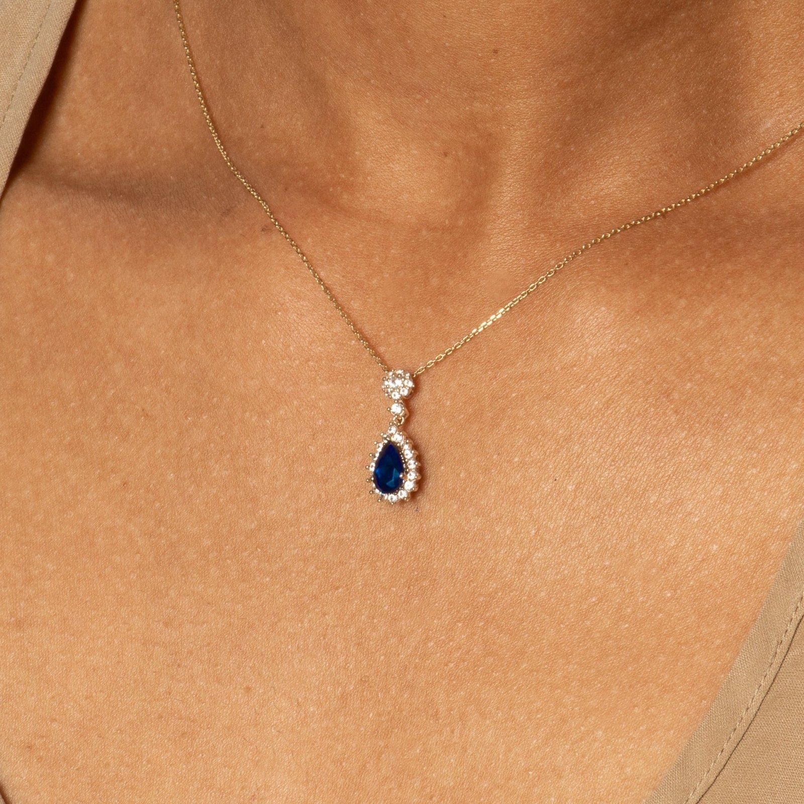 10k Yellow Gold Teardrop Sapphire Ring with White Sapphire Halo - Elegant Jewelry for Weddings, Anniversaries & Special Occasions