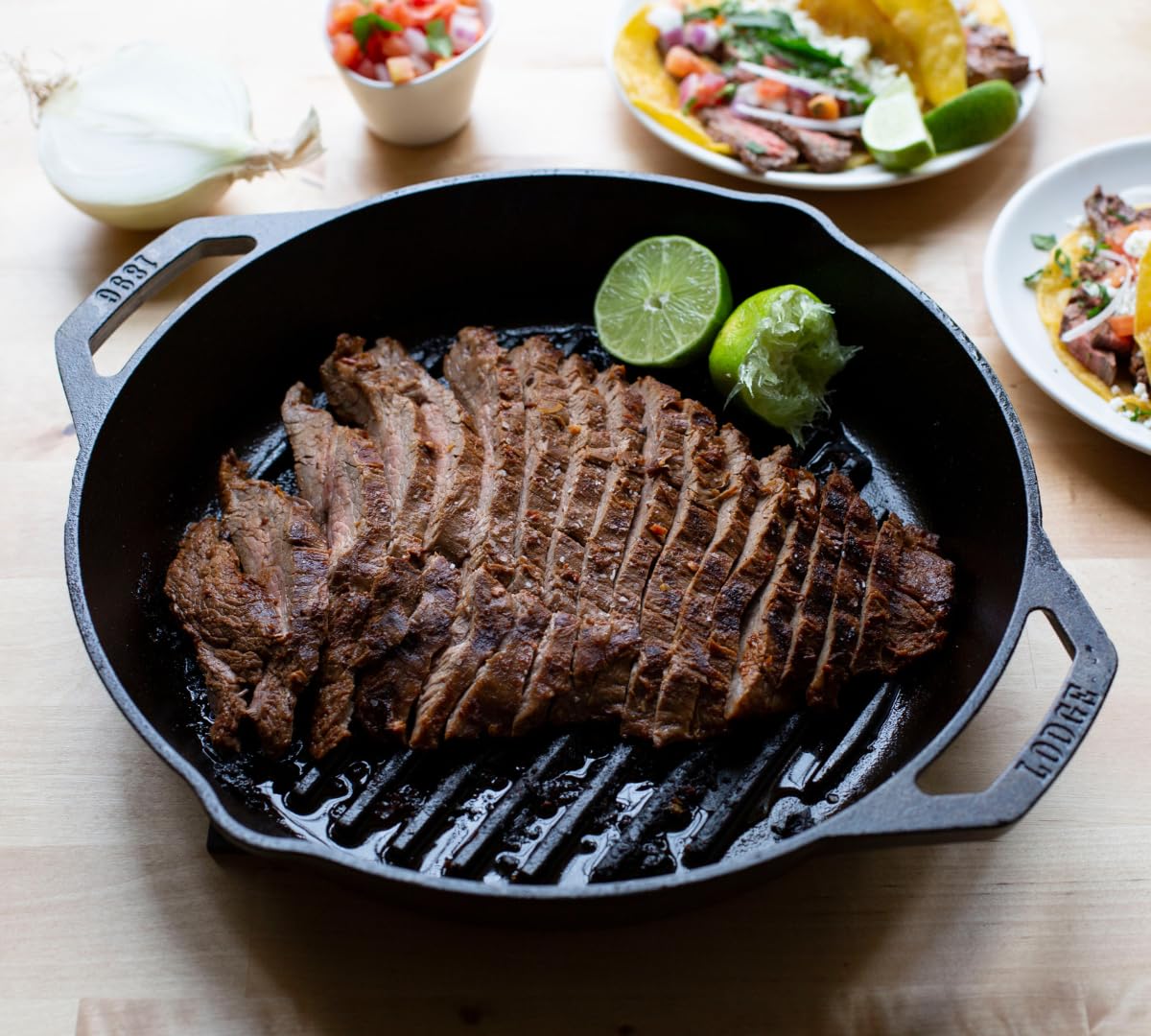 Lodge 12 Inch Pre-Seasoned Cast Iron Grill Pan with Dual Handles - Perfect for Stovetop, Oven & Outdoor Cooking - Ideal for Grilling Steaks, Burgers & Vegetables