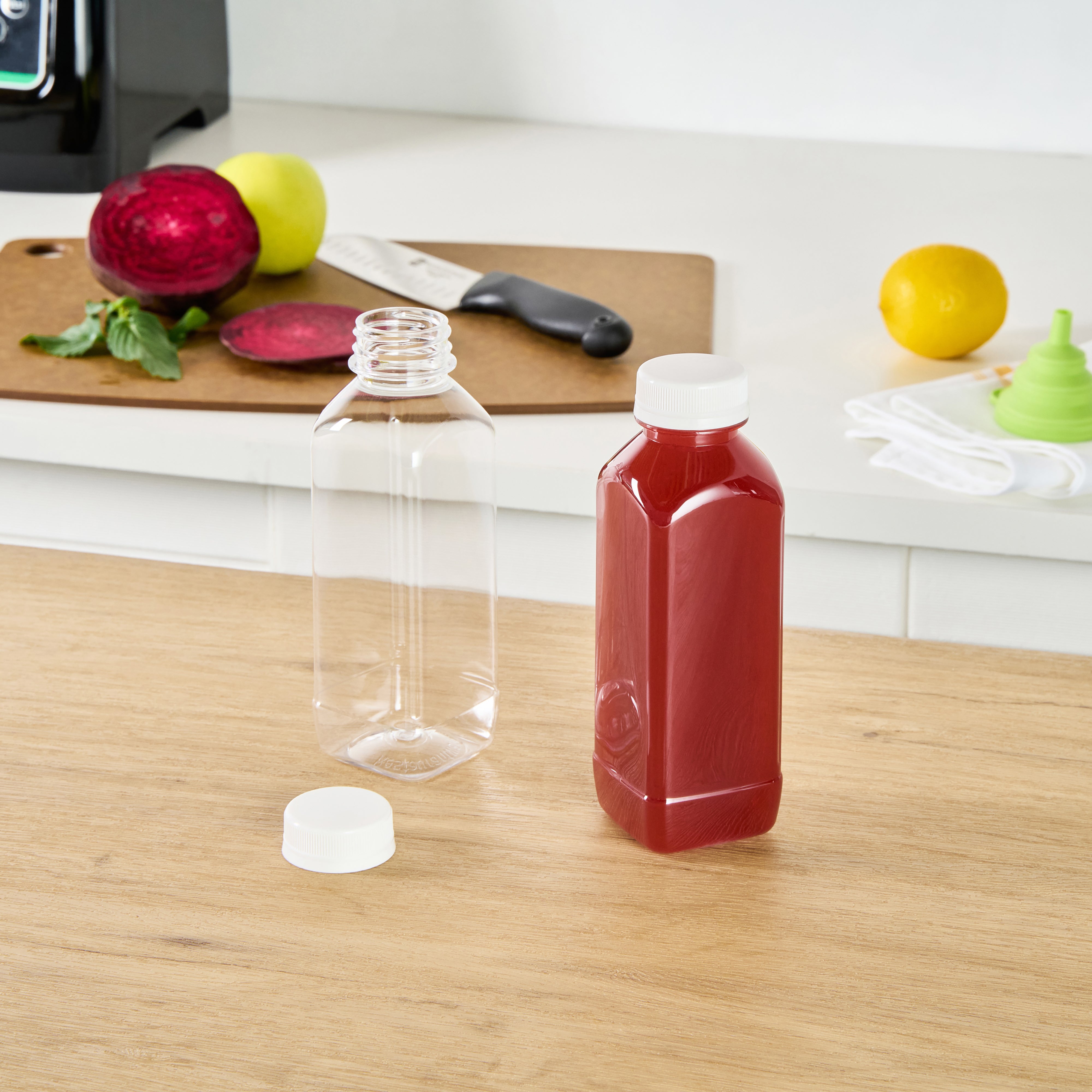 16 oz Square Clear Plastic Cold Pressed Juice Bottles with Safety Cap - 2.25