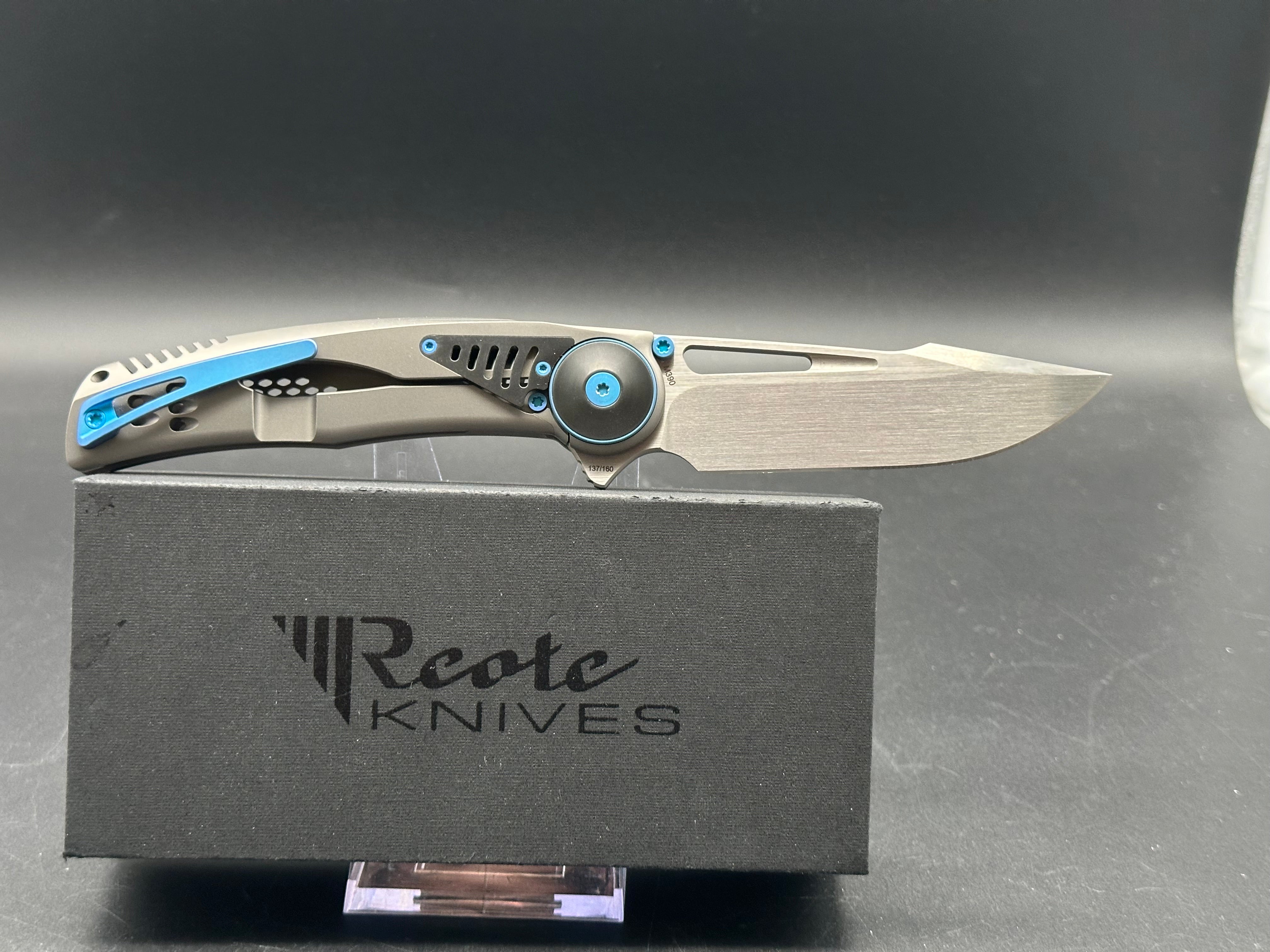 REATE GTR Titanium Folding Knife with Zirconium Inlay & Blue Hardware - M390 Steel Blade - EDC Pocket Knife for Outdoor Camping, Hiking and Everyday Carry