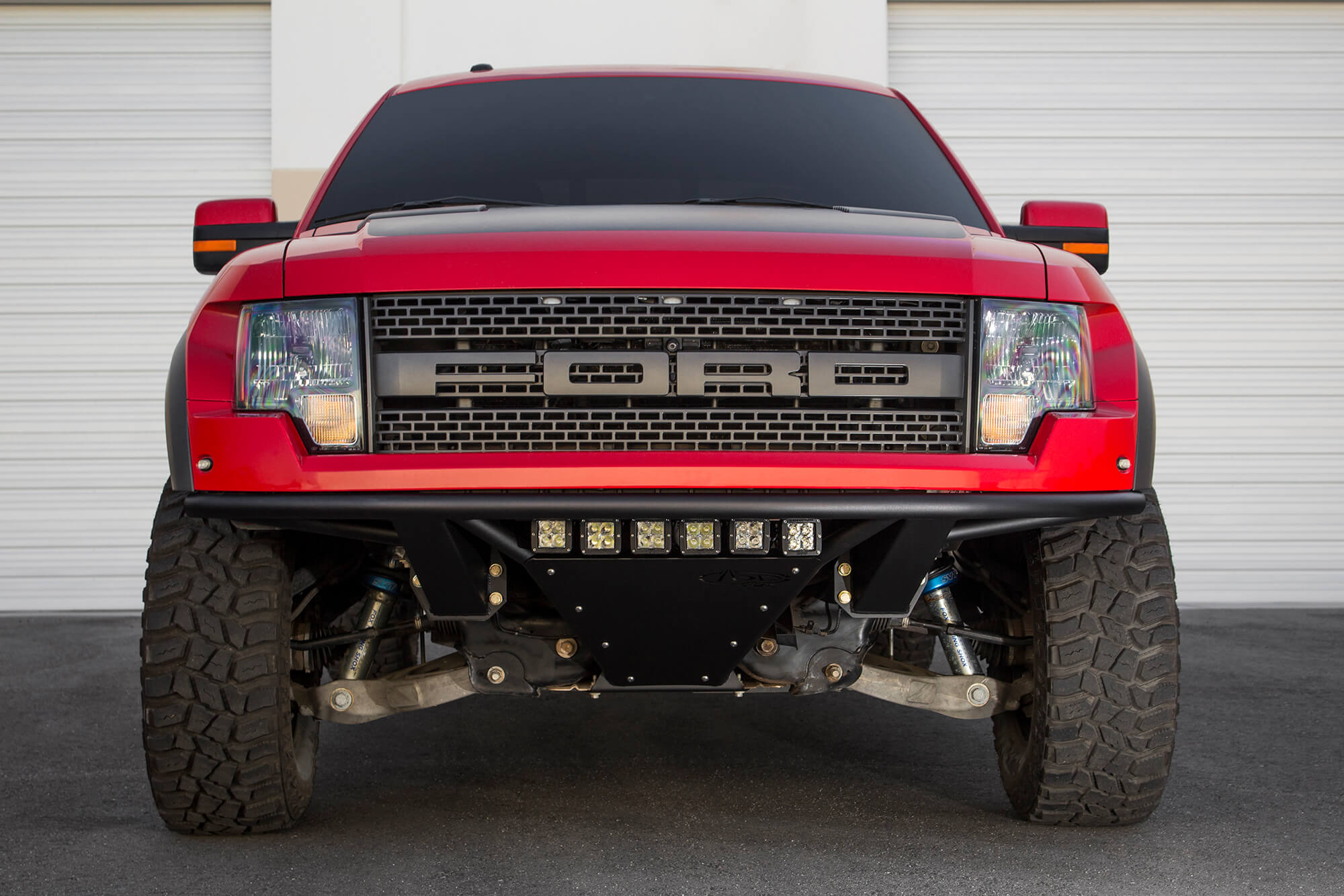 2010-2014 Ford Raptor ADD Pro Front Bumper by Addictive Desert Designs | Heavy-Duty Off-Road Protection for Tough Terrains & Adventure Driving
