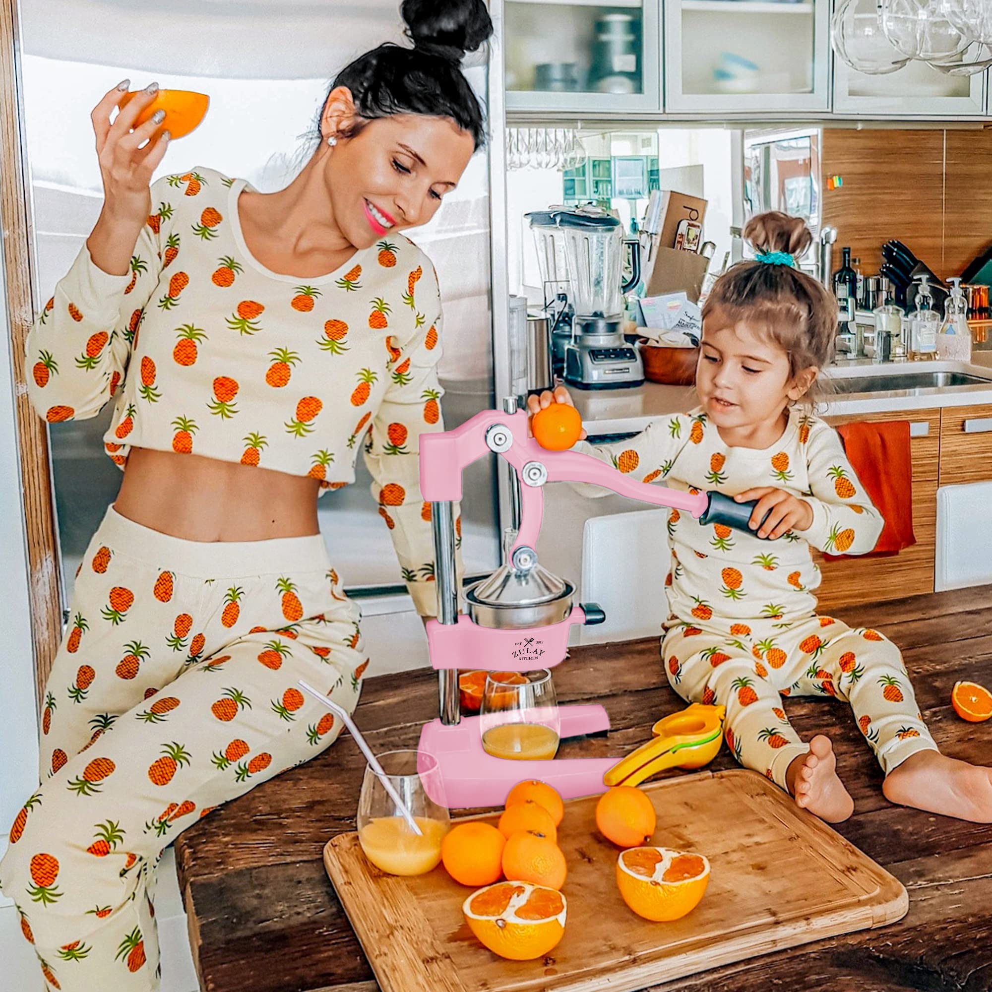 Zulay Kitchen Heavy Duty Cast Iron Orange Juice Squeezer - Professional Stainless Steel Citrus Juicer for Lemon, Lime & Grapefruit - Easy to Clean Manual Citrus Press with Sturdy Base - Perfect for Bars, Restaurants & Home Kitchen (Pink)