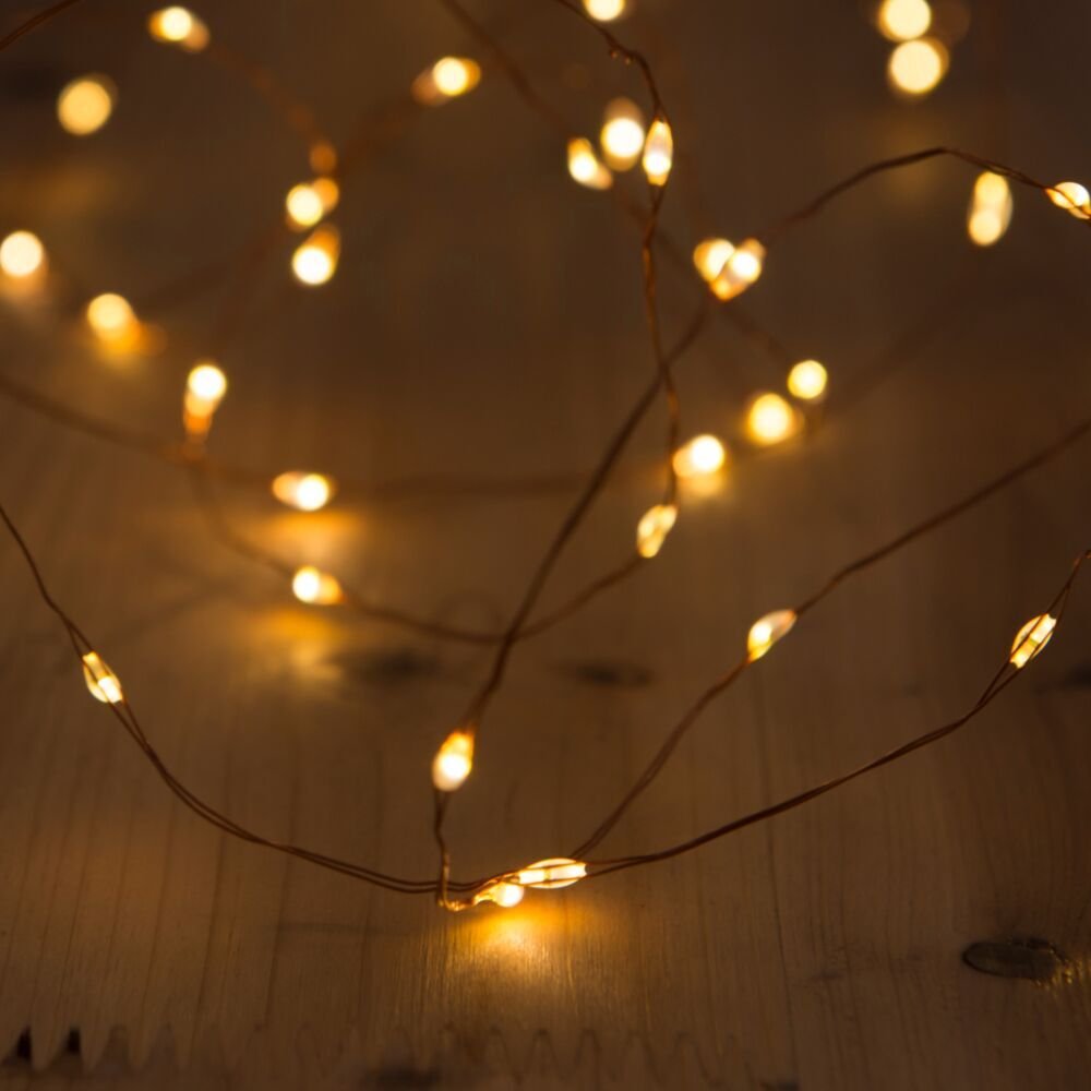 200 LED Solar Powered String Lights - 40ft Waterproof Copper Wire Fairy Lights for Outdoor & Indoor Use - Warm White Starry Lights for Garden, Patio, Home Decor, Wedding & Party Lighting