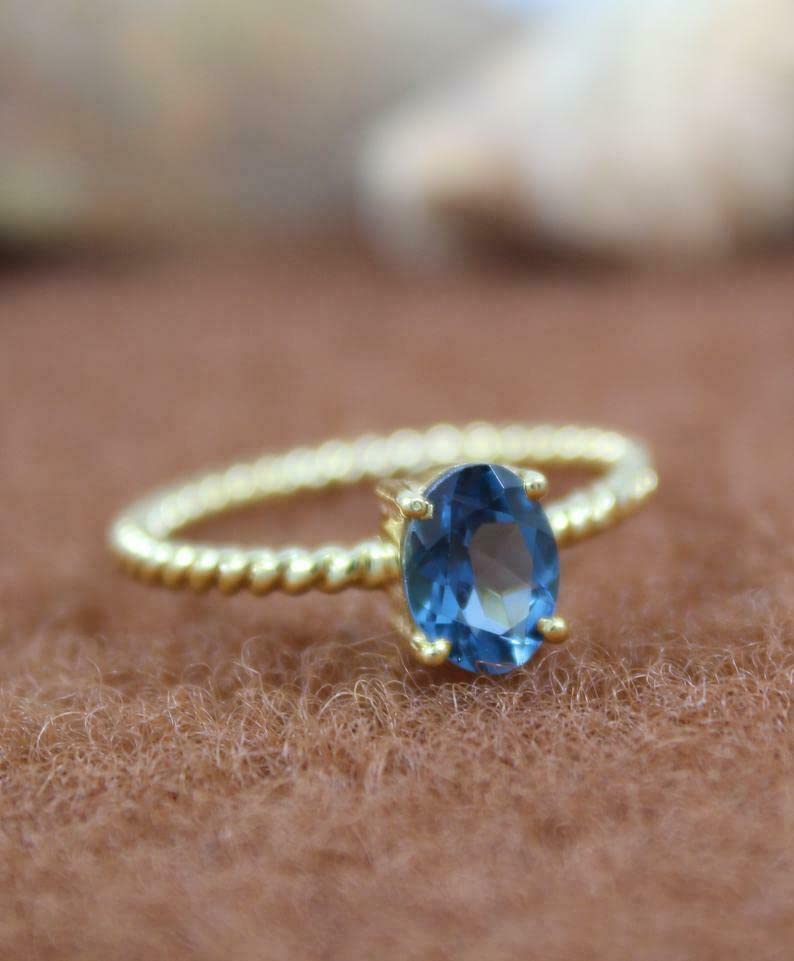 1ct Oval Cut London Blue Topaz Engagement Ring for Women - 14K Yellow Gold Plated Braided Band, Perfect for Proposals, Anniversaries & Special Occasions