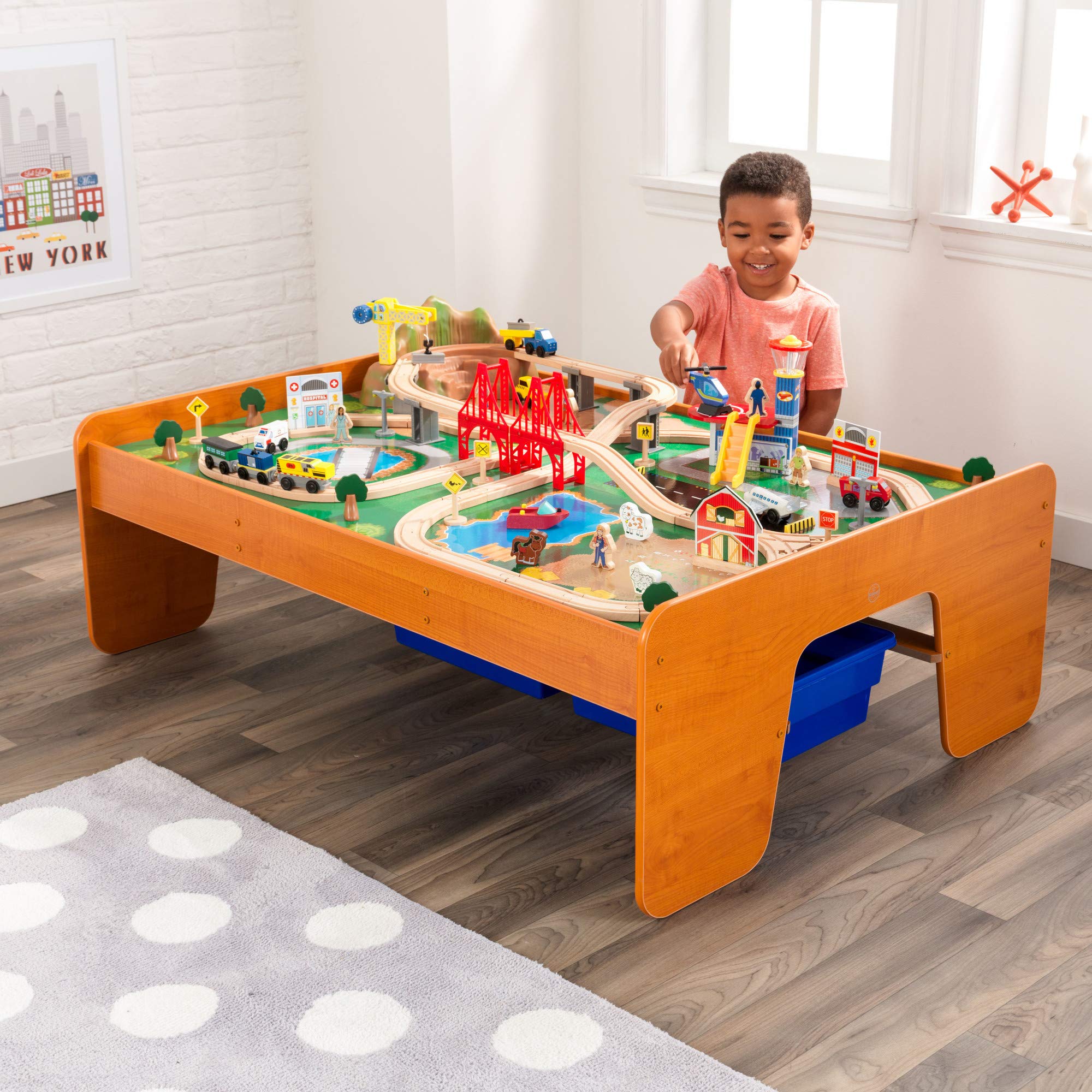 KidKraft Ride Around Town Wooden Train Set with Table - 100-Piece Playset Includes Helicopter, Airplane & Farm Accessories - Storage Bins & Major Brand Compatibility - Perfect for Preschool Playrooms & Toddler Birthday Gifts (Honey Finish)