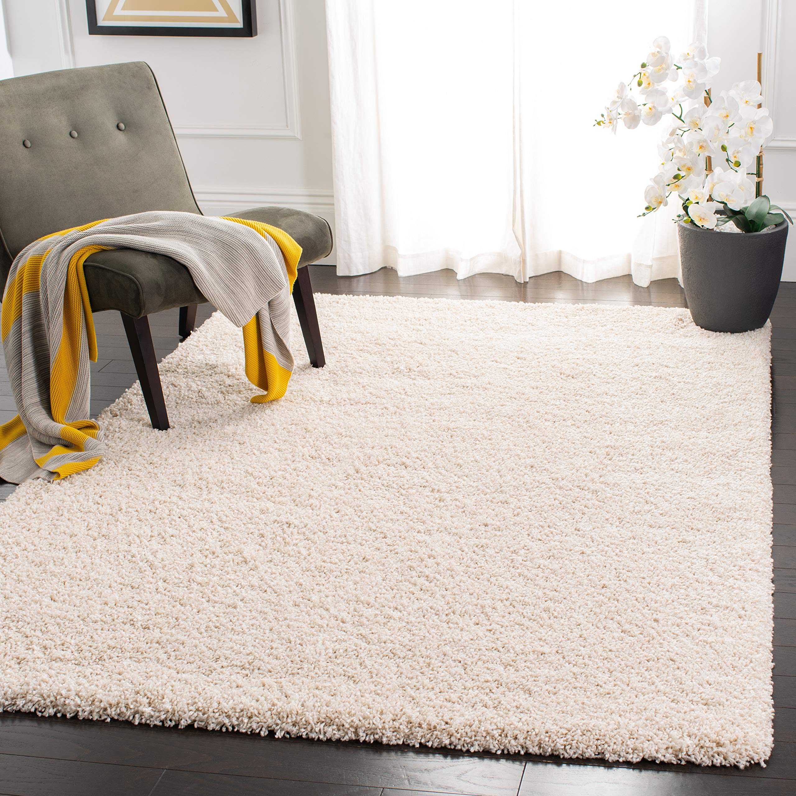 SAFAVIEH Evolution Shag Collection 9' x 12' Ivory EVO520A Solid Non-Shedding Plush Area Rug - 1.8-inch Thick Soft Carpet for Living Room, Bedroom, Dining Room & Entryway | Perfect for Cozy Home Decor & High-Traffic Areas