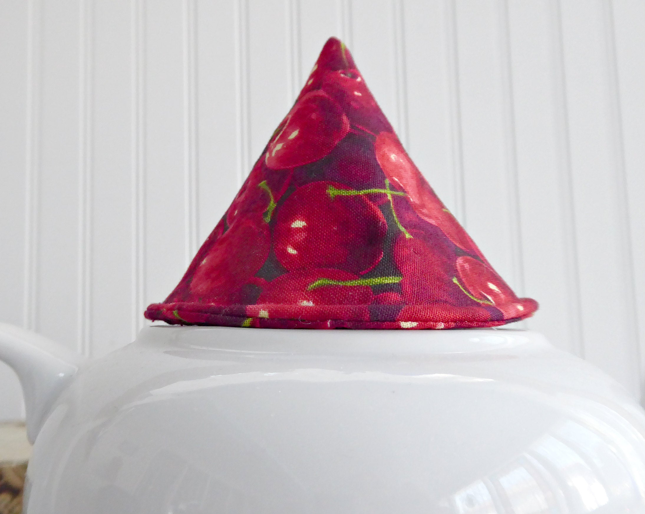 Red Cherries Knob Holder - Teapot Lid Holder with Soft Padded Interior & Exterior - Perfect for Kitchen, Tea Parties, and Gift Giving