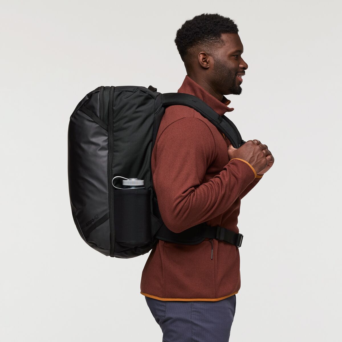 Cotopaxi Allpa 42L Travel Backpack - 42L Carry-On Backpack for Travel, Hiking & Adventure | Durable Water-Resistant Backpack | Blue Spruce/Abyss Color | Perfect for Air Travel, Camping & Outdoor Activities