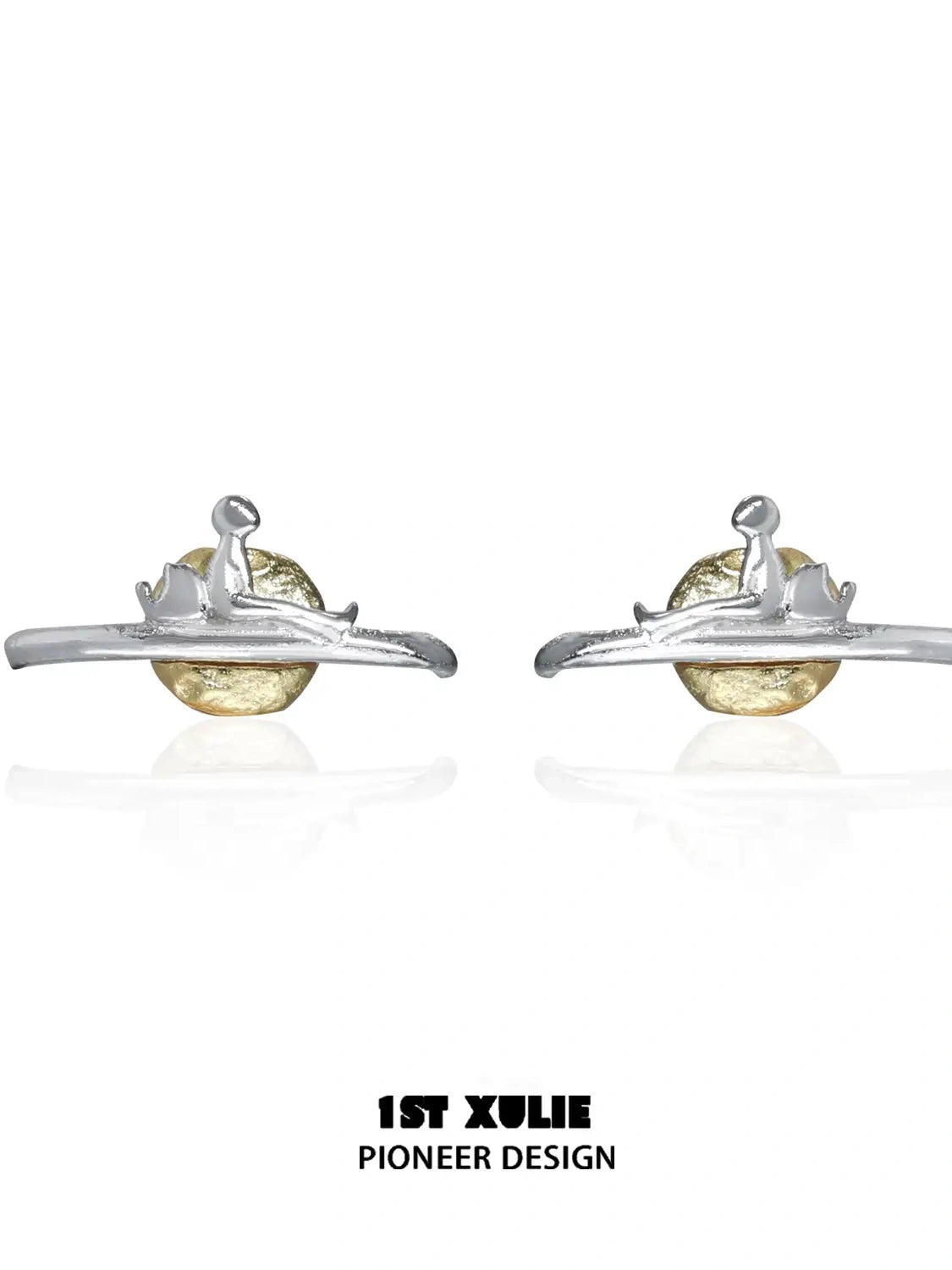 A pair of silver earrings