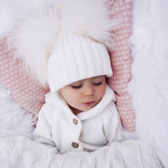 Cozy Knitted Double Faux Fur Pom Pom Winter Hat for Women - Warm Beanie with Soft Faux Fur Balls - Perfect for Cold Weather, Snow Days & Outdoor Activities