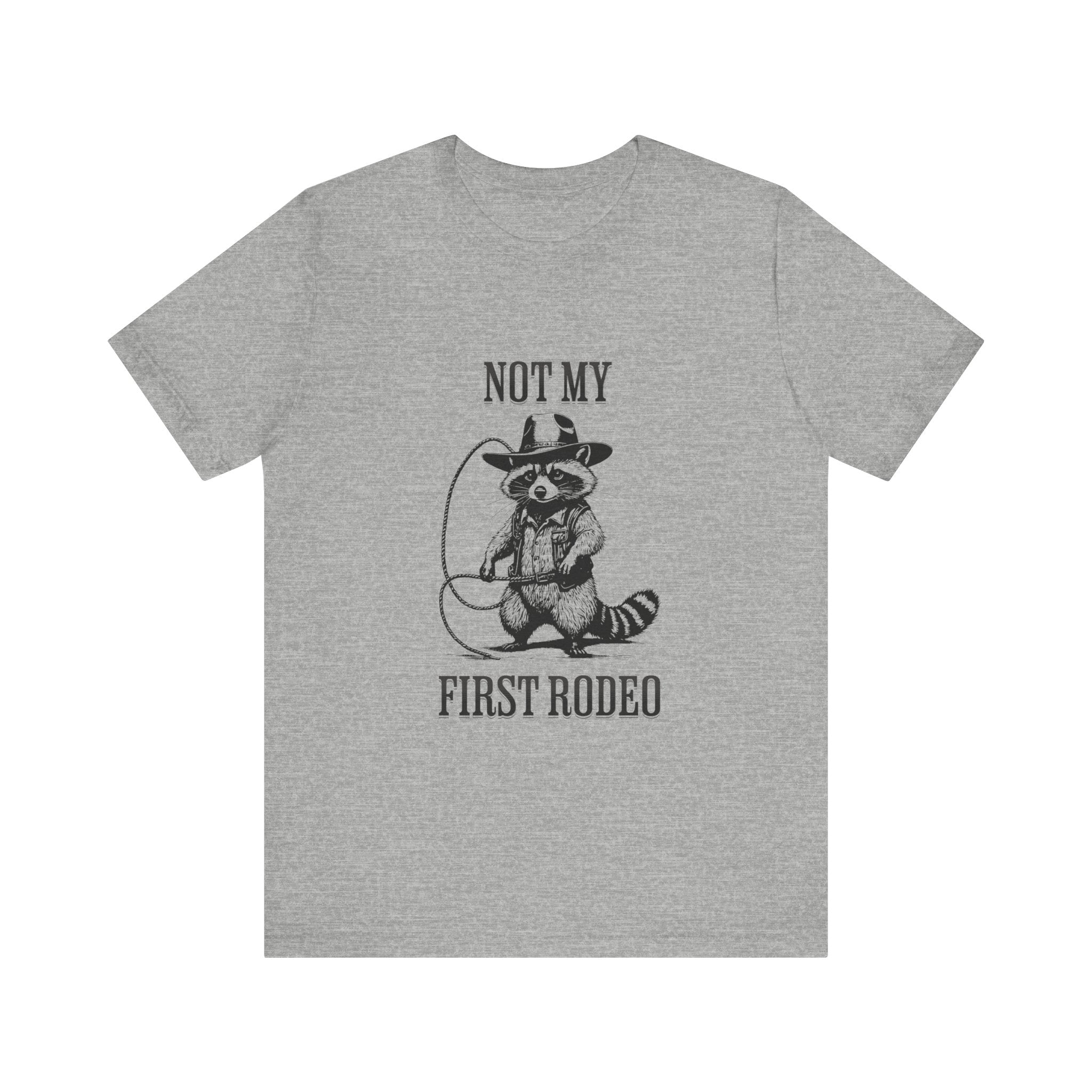 Funny Western Graphic Cotton Tee - Not My First Rodeo Cowboy Raccoon Shirt | Cute Quirky Country Style T-Shirt for Rodeo Fans & Animal Lovers | Perfect for Rodeo Events, Country Concerts & Casual Wear