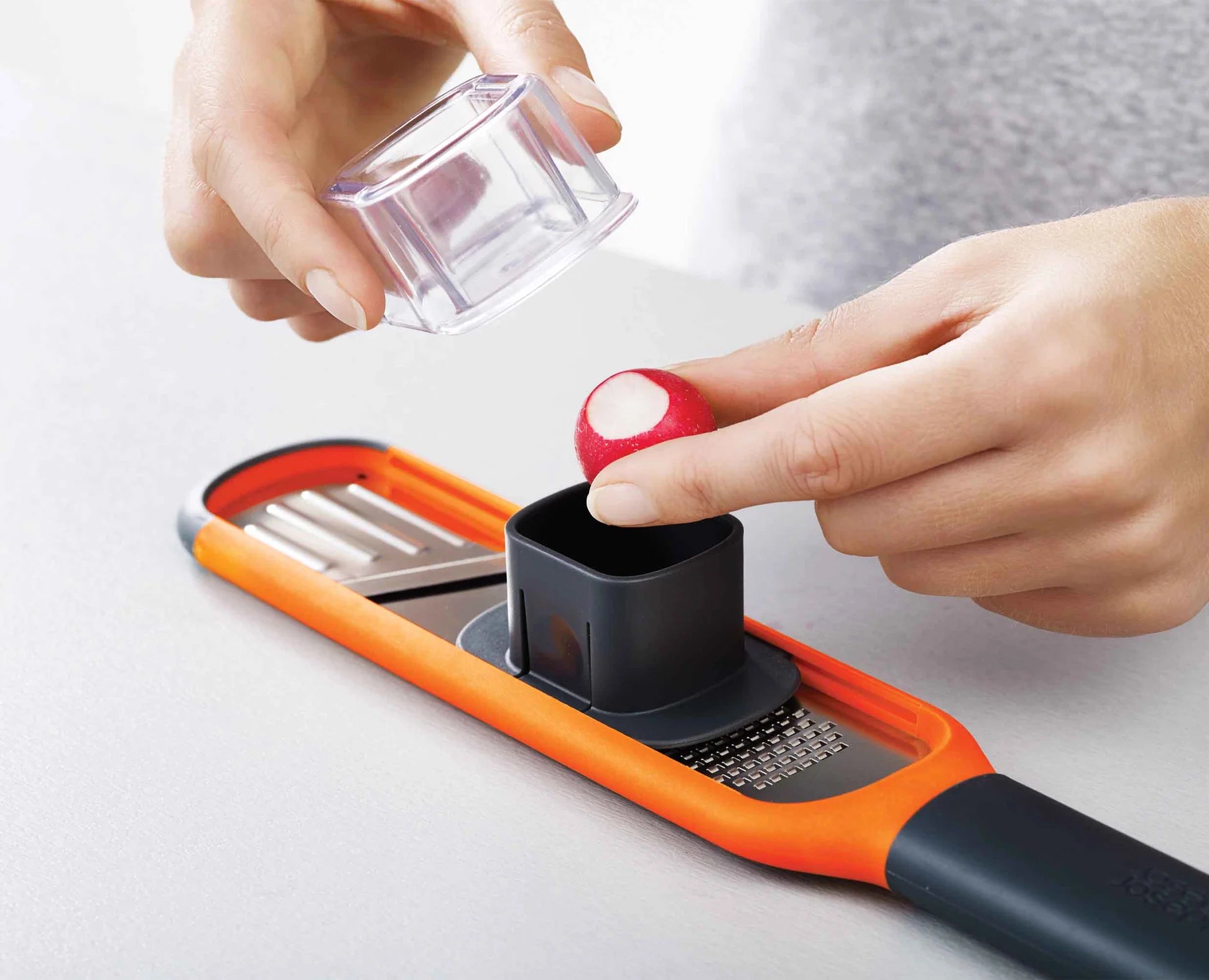 Handi Grate Multi-Function Grater - 4-in-1 Kitchen Tool for Cheese, Vegetables, Fruits & Zesting - Perfect for Cooking, Baking & Meal Prep (Orange)
