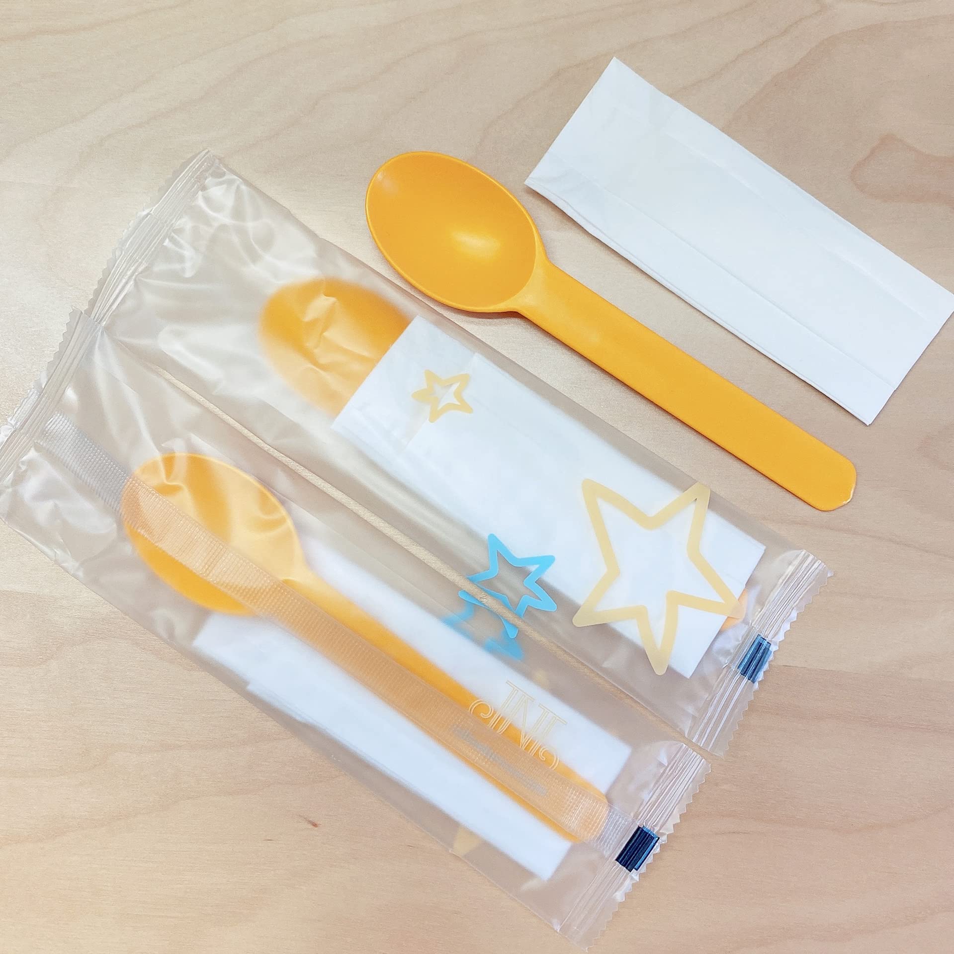 Eco-Friendly Disposable Corn Starch Spoon with Napkin Set - 500 Count, Orange - Perfect for Parties, Picnics, and Takeout Meals