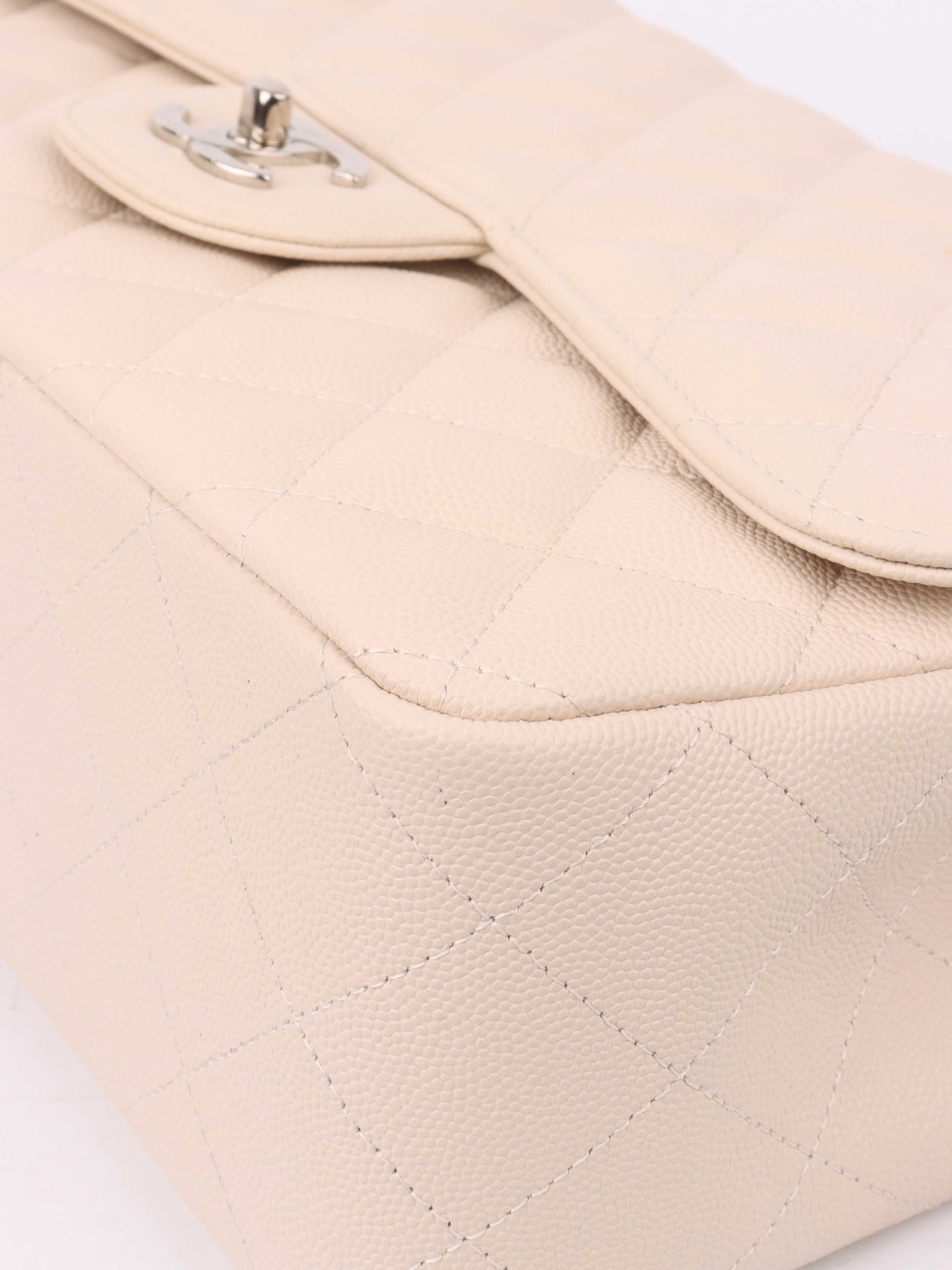 Chanel Jumbo Ivory Caviar Classic Flap Bag - Luxury Designer Handbag for Women | Perfect for Parties, Weddings & Special Occasions
