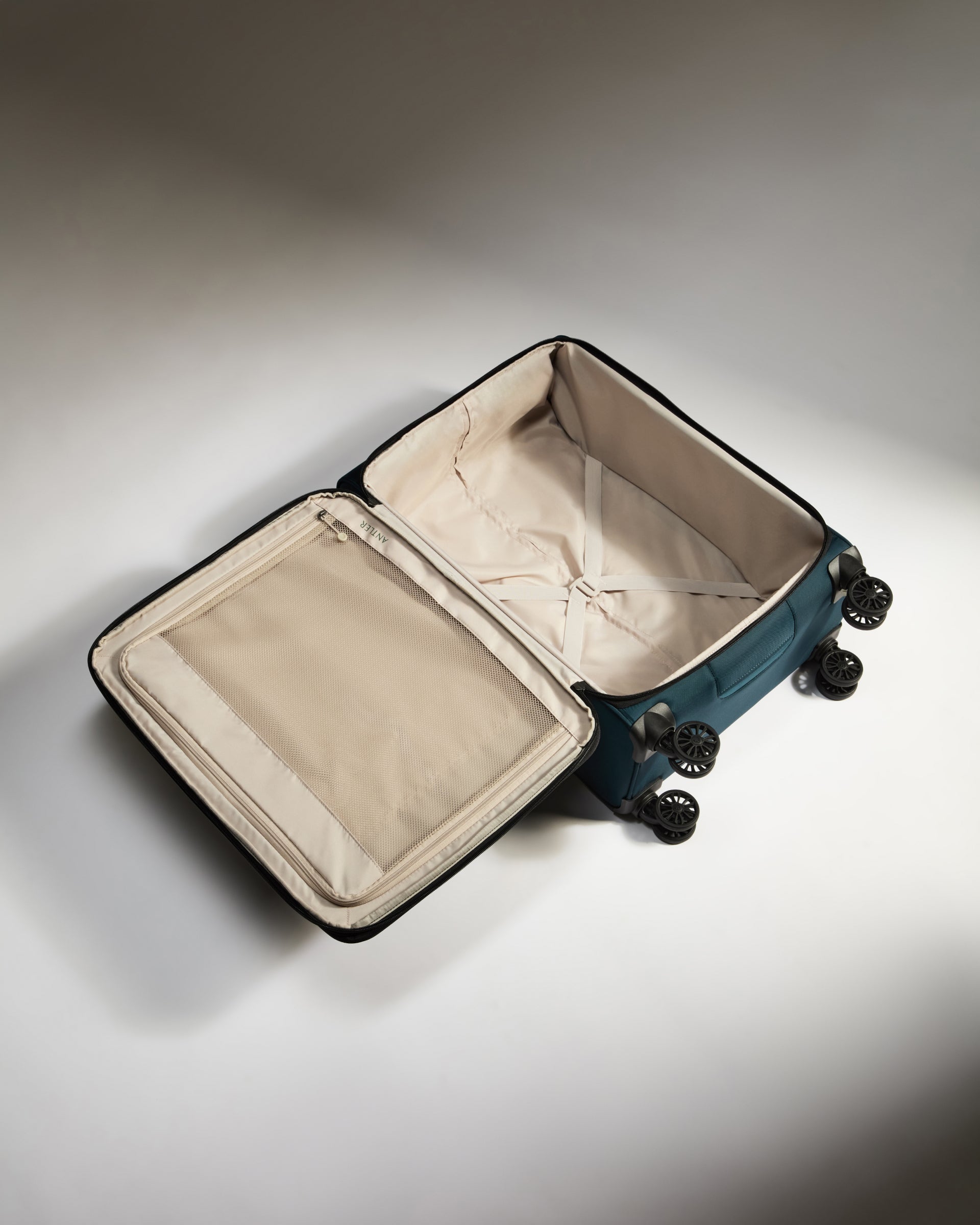 Lightest Medium Luggage in Indigo Soft Stripe - Durable Carry-On Suitcase for Travel & Business Trips