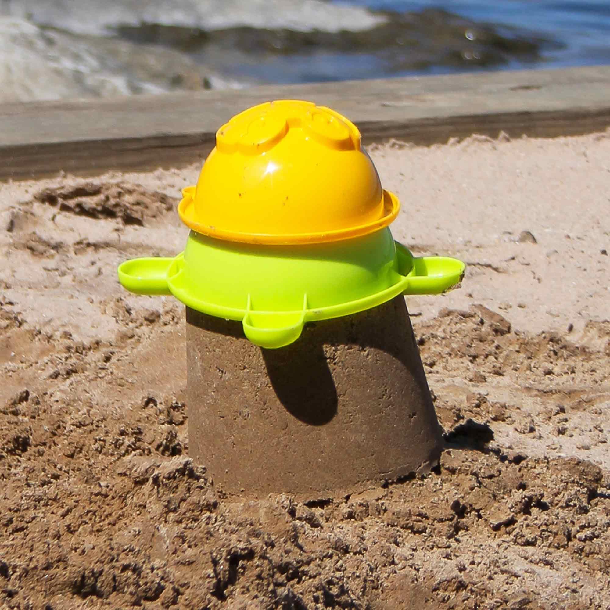HABA Sand Bucket Scooter - 4 Piece Nesting Beach Toy Set for Toddlers 1-3 Years - Includes Sand Bucket, Sieve, Shovel & Rolling Pail - Perfect Summer Beach Toys for Kids - Great for Sandcastles, Seaside Play & Outdoor Activities