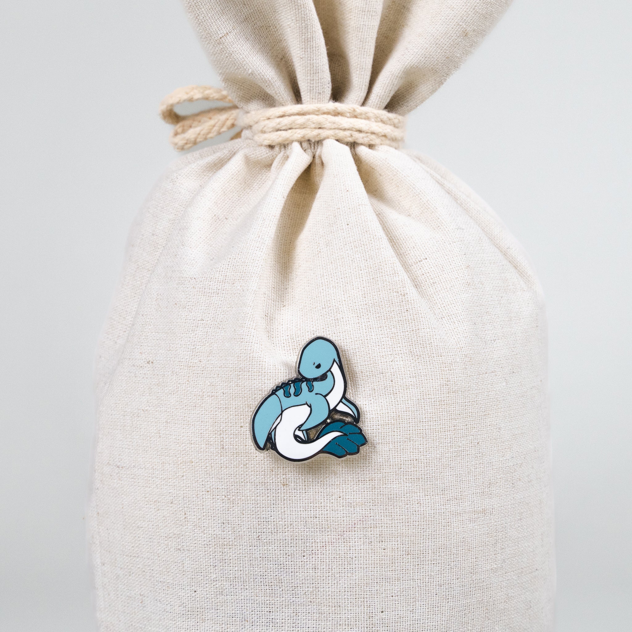Nessi Enamel Pin - Cute Cartoon Badge for Backpacks, Jackets & Hats | Unique Collectible Accessory for Pin Lovers & Gift Ideas