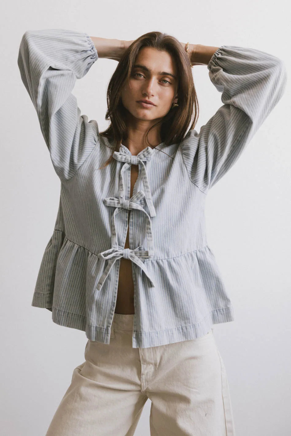 Elegant Maggie Peplum Tie Blouse in Light Wash - Women's Casual & Office Wear - Perfect for Work, Dates & Special Occasions