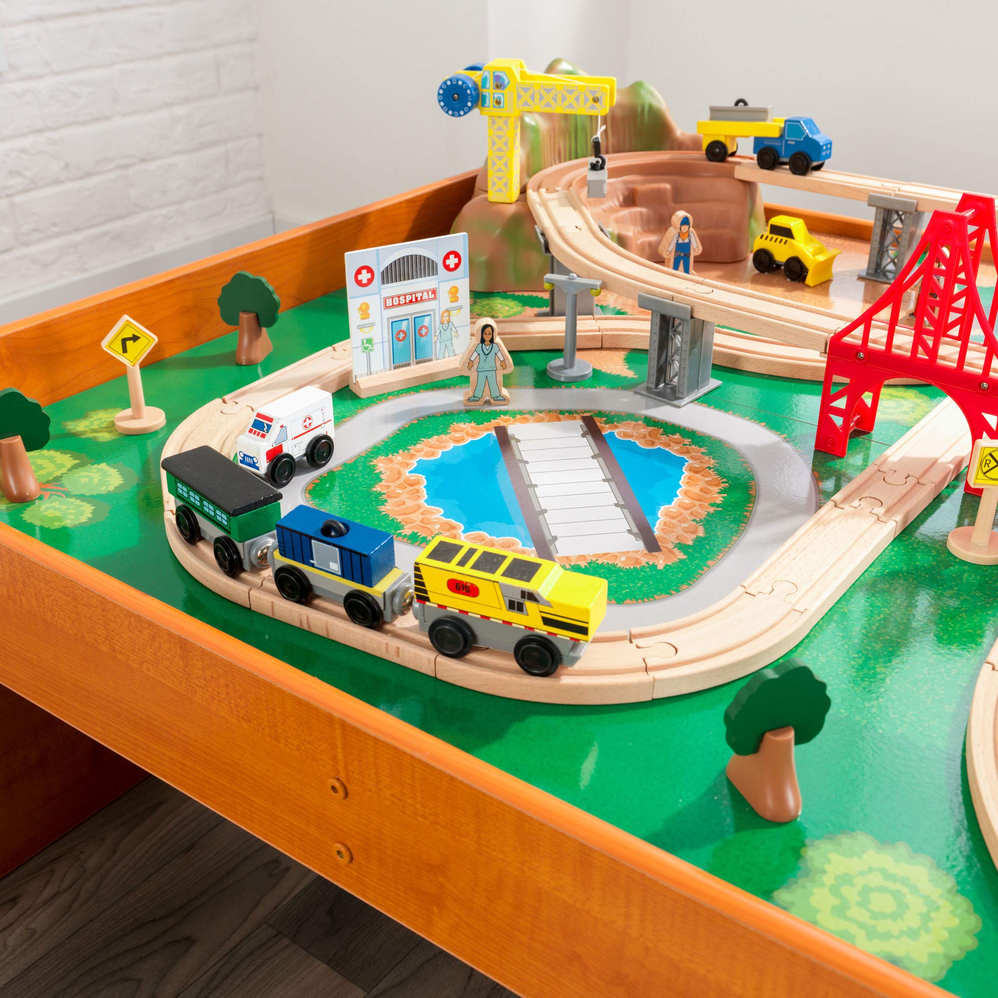 KidKraft Ride Around Town Wooden Train Set with Table - 100-Piece Playset Includes Helicopter, Airplane & Farm Accessories - Storage Bins & Major Brand Compatibility - Perfect for Preschool Playrooms & Toddler Birthday Gifts (Honey Finish)