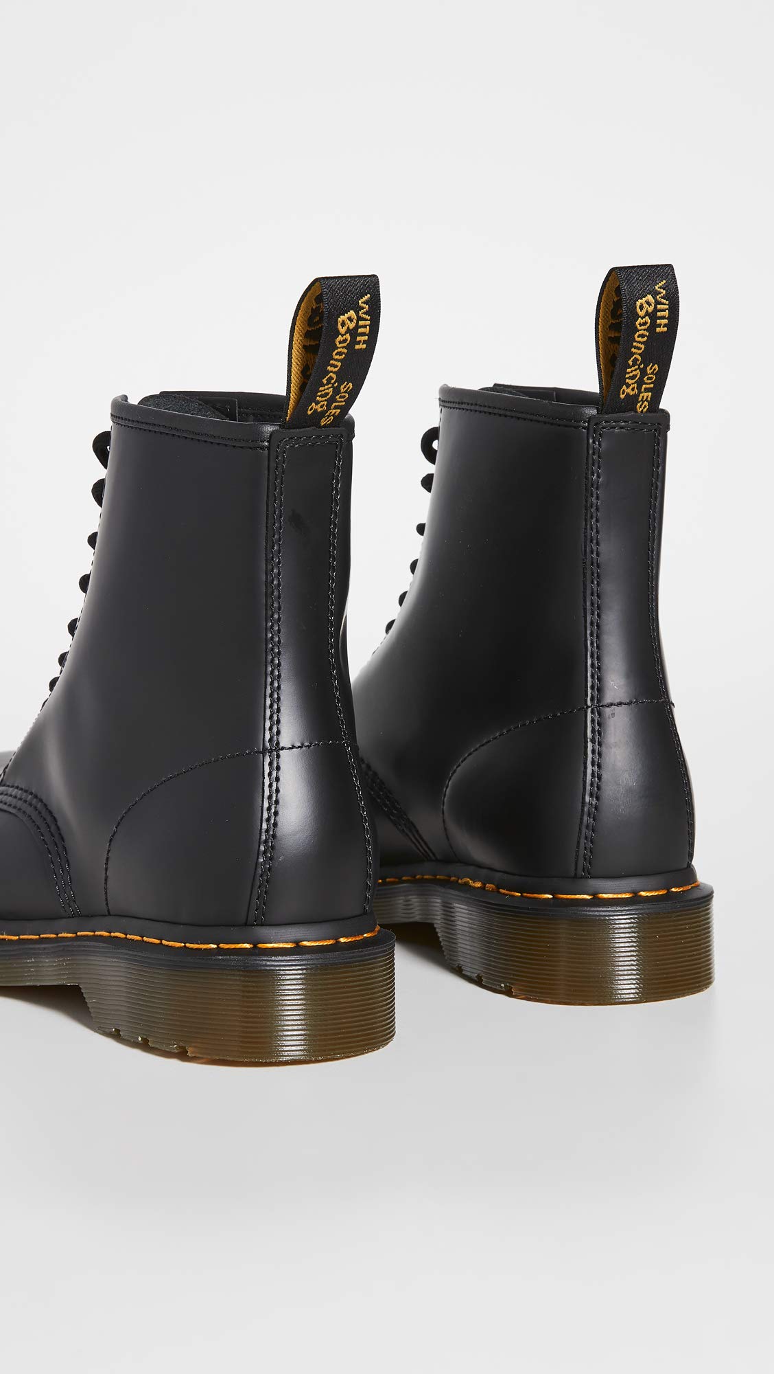 Dr. Martens 1460 8-Eye Leather Boots for Men & Women - Classic Black Ankle Boots with Air-Cushioned Sole | Perfect for Punk Fashion, Work & Everyday Wear