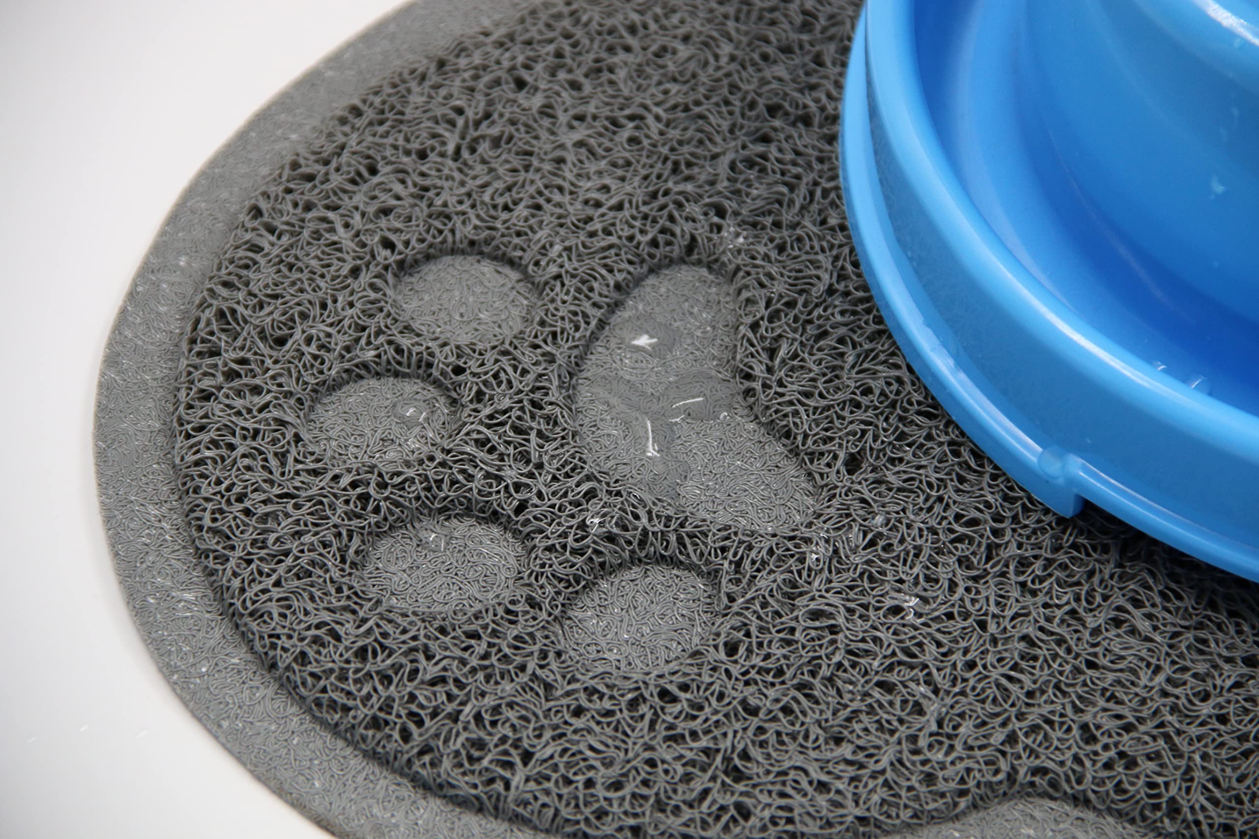 **Pet Feeding Mat for Large Dogs & Cats - Non-Slip, Waterproof Dog Bowl Mat for Food & Water - Easy to Clean Pet Placemat - Perfect for Messy Eaters & Spill Protection**    *(场景: Ideal for kitchens, outdoor feeding areas, or travel to keep floors clean and pets comfortable.)*