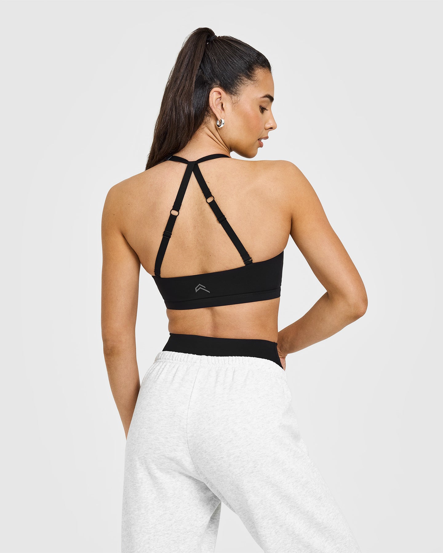 High-Performance Unified Twist Sports Bra for Women - Breathable & Supportive Workout Top in Black | Ideal for Yoga, Running & Gym