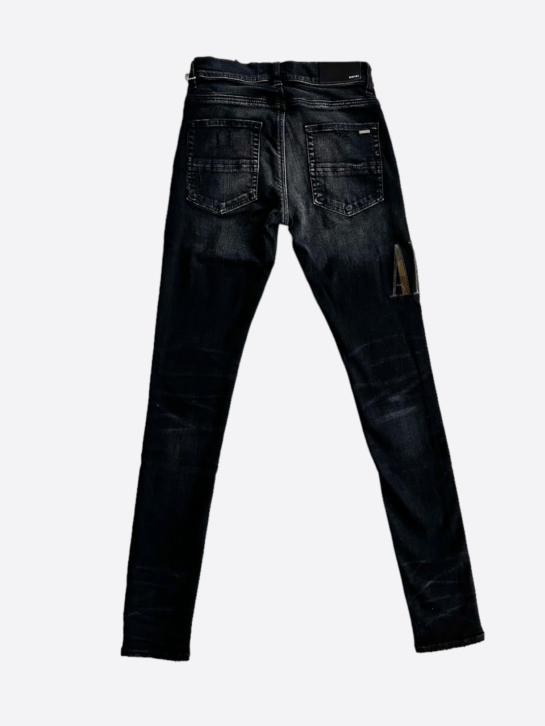 Amiri Aged Black Camouflage Core Applique Logo Jeans for Men - Distressed Denim Pants with Unique Design, Perfect for Streetwear and Casual Outfits