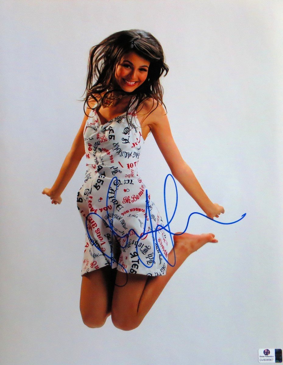Victoria Justice Signed Autographed 11X14 Photo - Cute & Sexy Dress Jumping Pose - Limited Edition Collectible Memorabilia - Perfect for Fans, Wall Decor, and Gift Giving