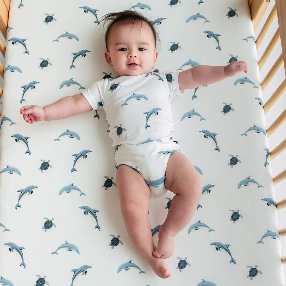 Kyte Baby Organic Cotton Crib Sheet - Soft & Breathable Dolphin Print Fitted Crib Sheet for Nursery, Baby Bedding, Crib Mattress Cover (Perfect for Newborns, Toddlers & Daycare Use)