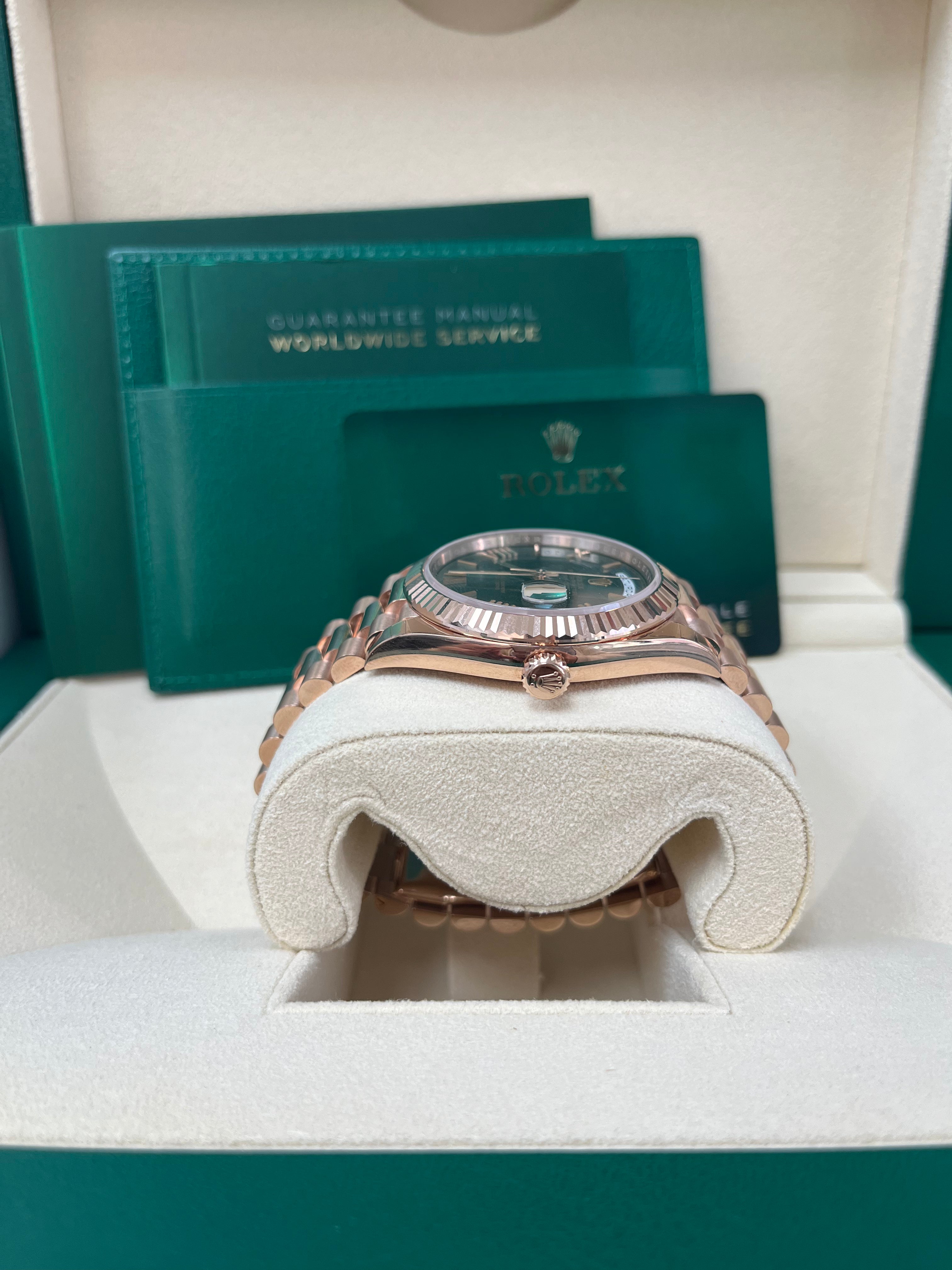 Rolex Day Date 40 Rose Gold Watch with Green Roman Dial & Fluted Bezel (Ref#228235) - Luxury Dress Watch for Business & Formal Occasions