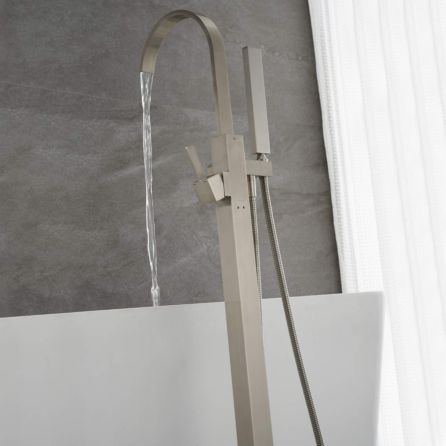 Freestanding Bathtub Faucet - Brushed Nickel Waterfall Tub Filler with Hand Shower, Single Handle Floor Mount Faucet for Modern Bathroom Decor | Perfect for Spa-Like Relaxation and Luxury Bath Experience