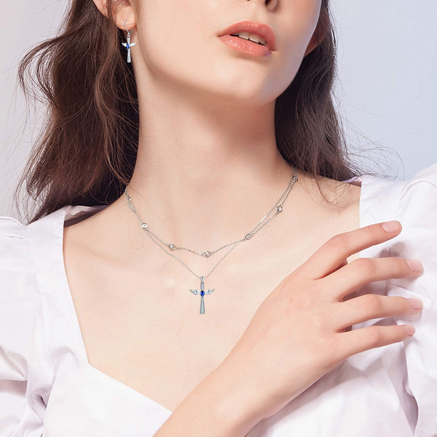 YL 925 Sterling Silver Cross Pendant Necklace with Cubic Zirconia & Angel Wing Dangle Earrings Set - Elegant Teardrop Created Sapphire Jewelry for Women, Perfect for Church, Weddings, Date Nights and Gift Giving