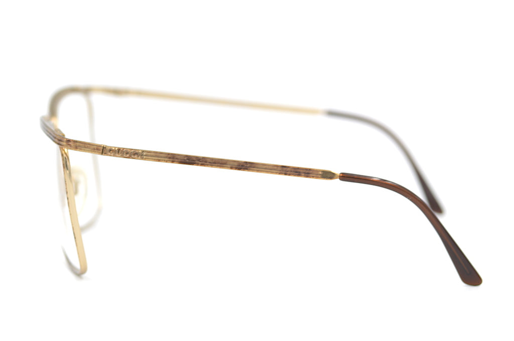Original Title: Gucci 2204 24E   Optimized Title: **Gucci 2204 24E Sunglasses - Luxury Designer Shades for Men & Women - UV Protection & Fashion Statement - Perfect for Outdoor, Travel & Everyday Wear**