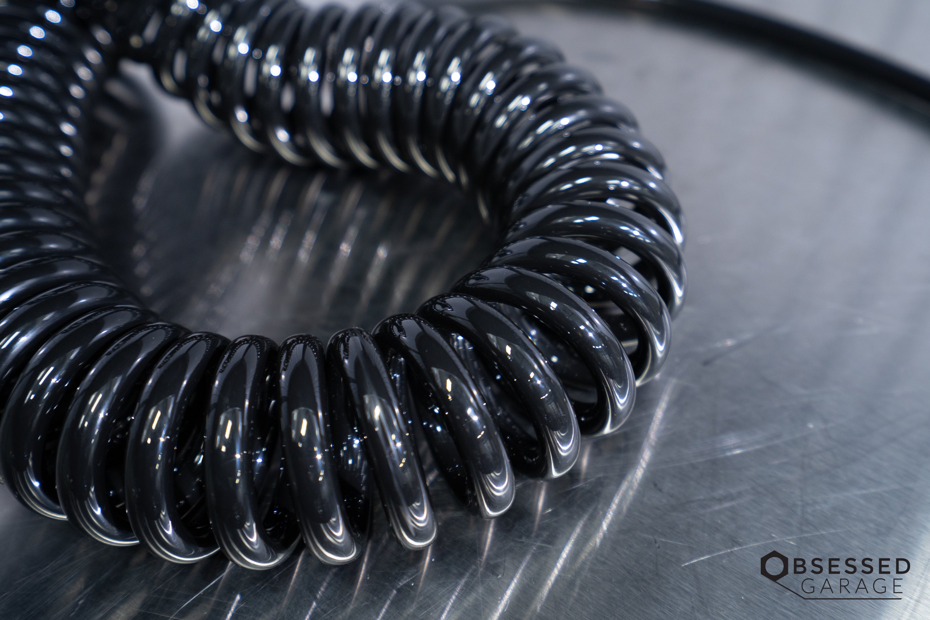 Prevost Spiral Hose with Fixed & Rotating 1/4